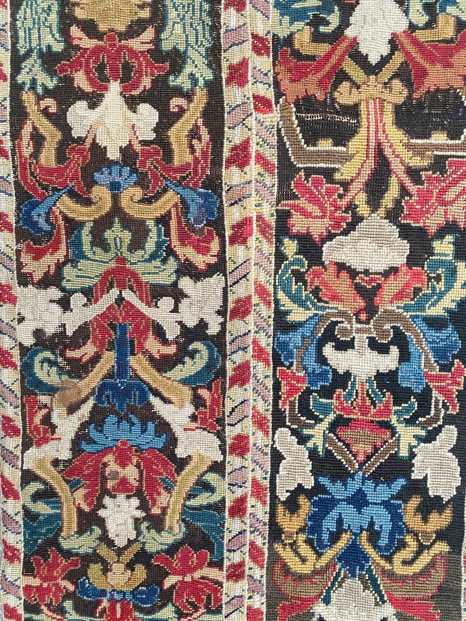 Beautiful needlepoint tapestry made up of two bands of 18th century tapestries with beautiful floral design and beautiful nice natural colors, entirely hand embroidered with needlepoint method with wool and silk.