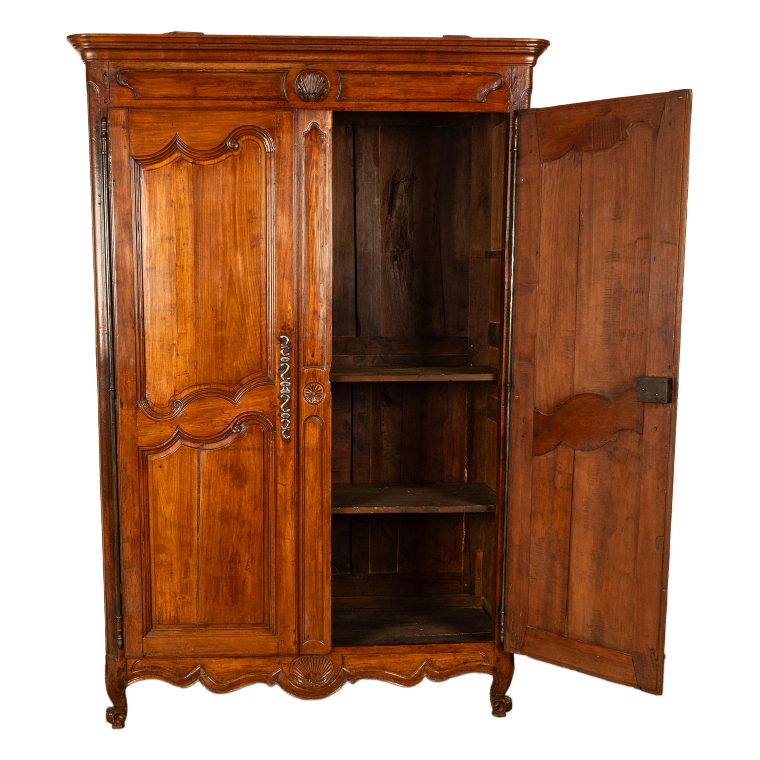 Intagliato Antique French 18th Century Provincial Carved Cherry Wood Armoire Wardrobe 1780 in vendita