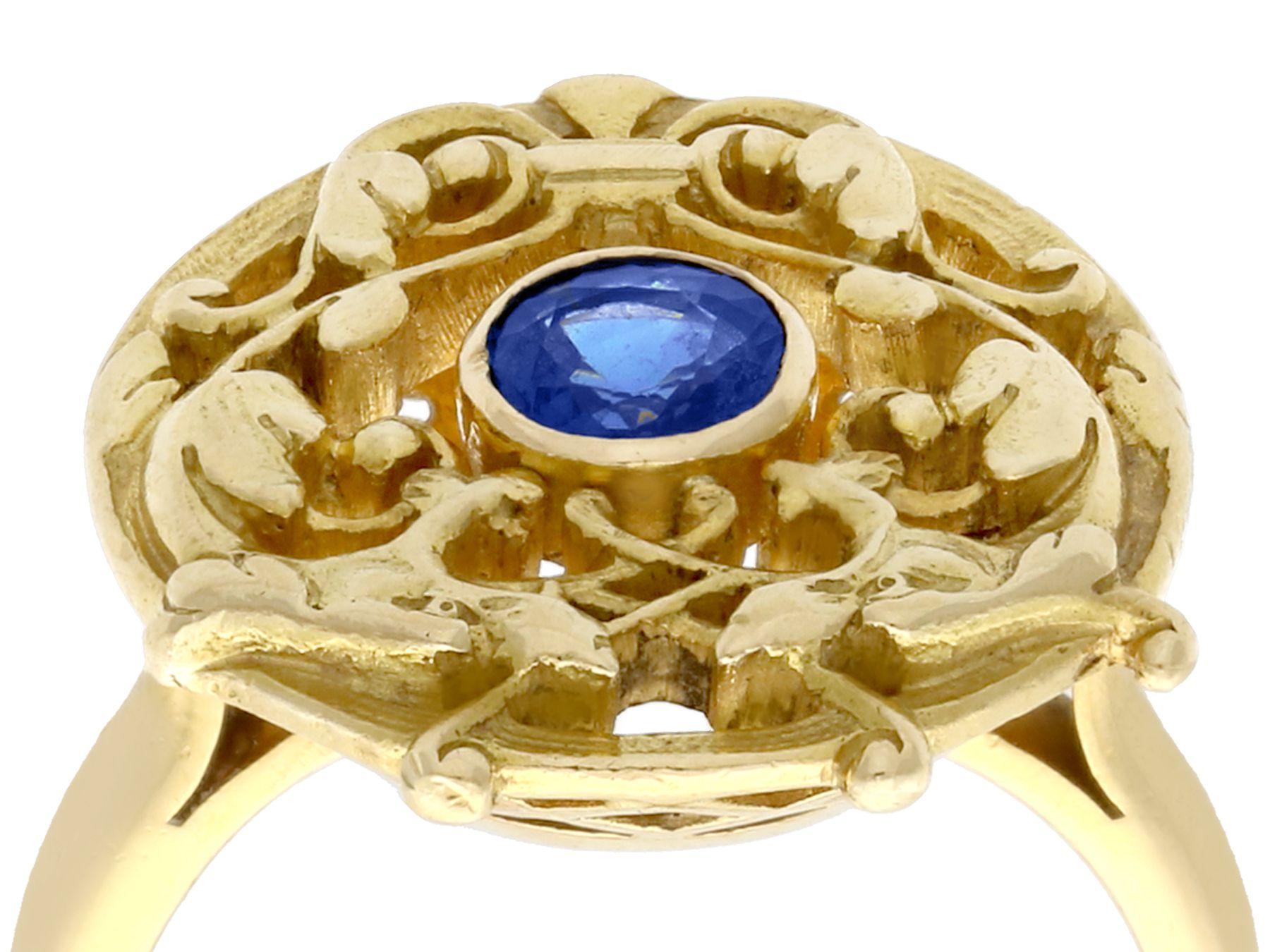 An impressive antique French 0.48 carat blue sapphire and 18 karat yellow gold dress ring; part of our diverse antique jewelry and estate jewelry collections.

This fine and impressive small sapphire ring has been crafted in 18k yellow gold.

The