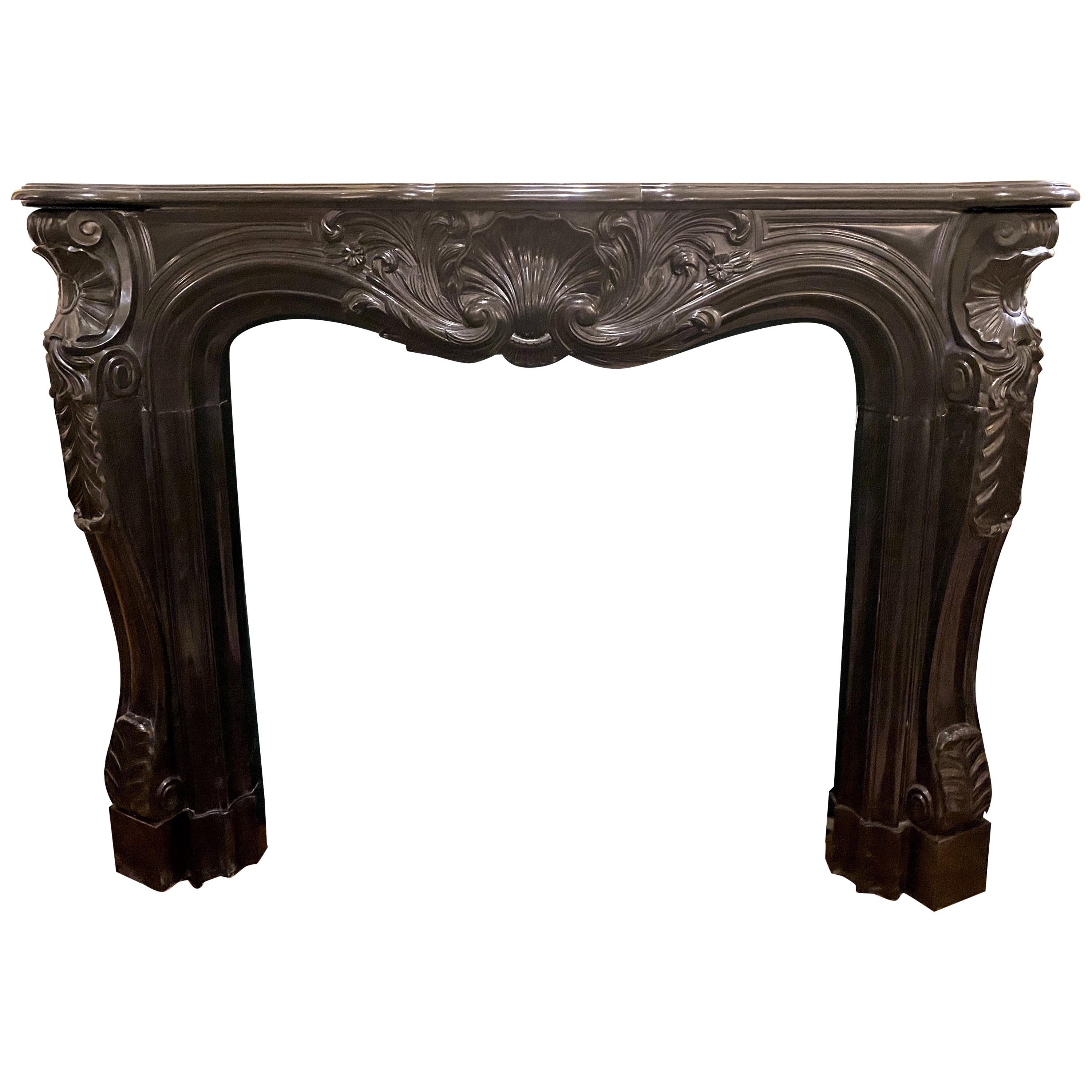 Antique French 19th Century Carved Black Marble Mantel