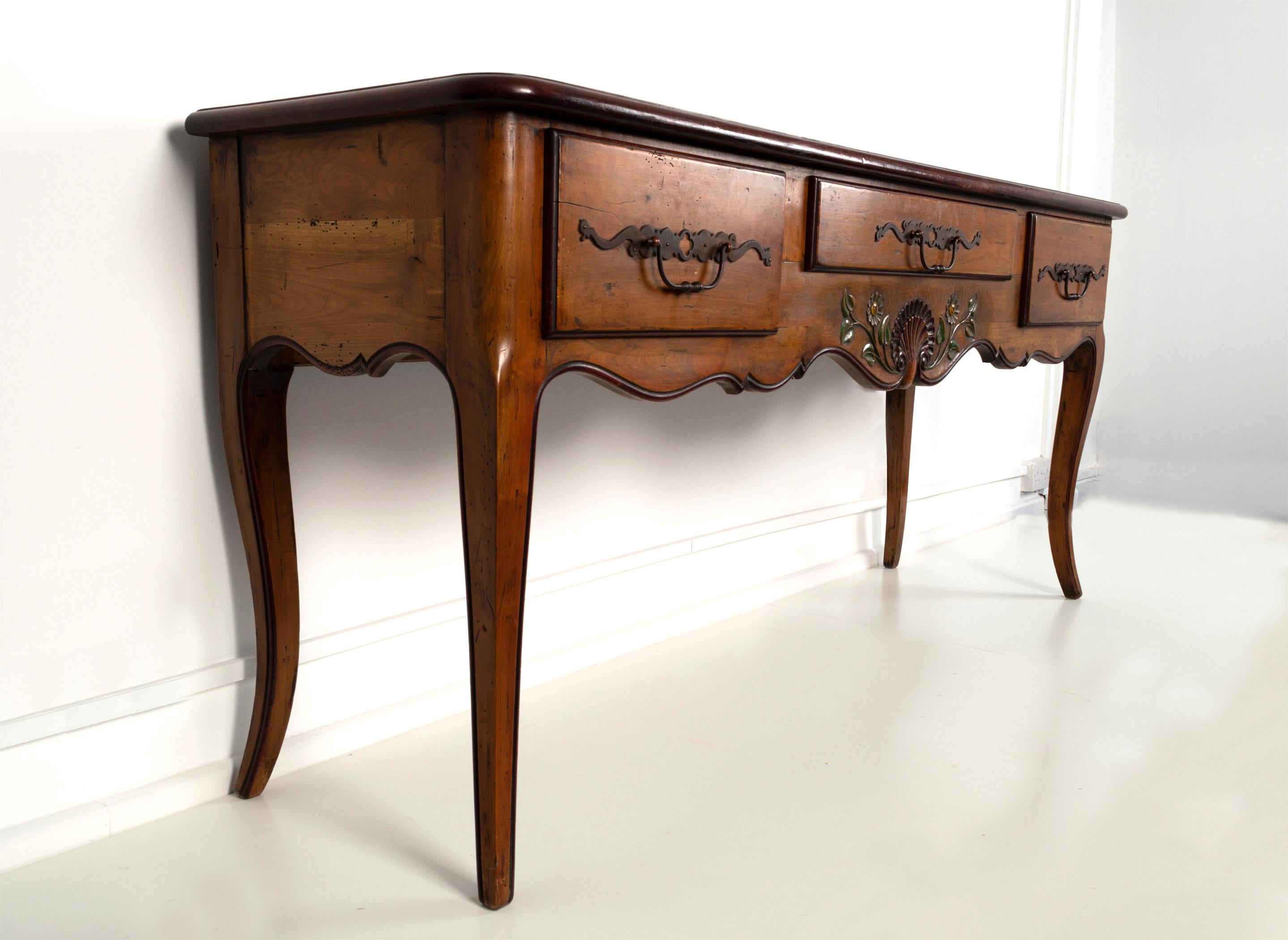 An Antique 19th Century French Solid Cherrywood Sideboard Server
A three drawer server with an attractive scalloped apron, rising on cabriole legs.
A beautiful example In excellent condition commensurate of age.