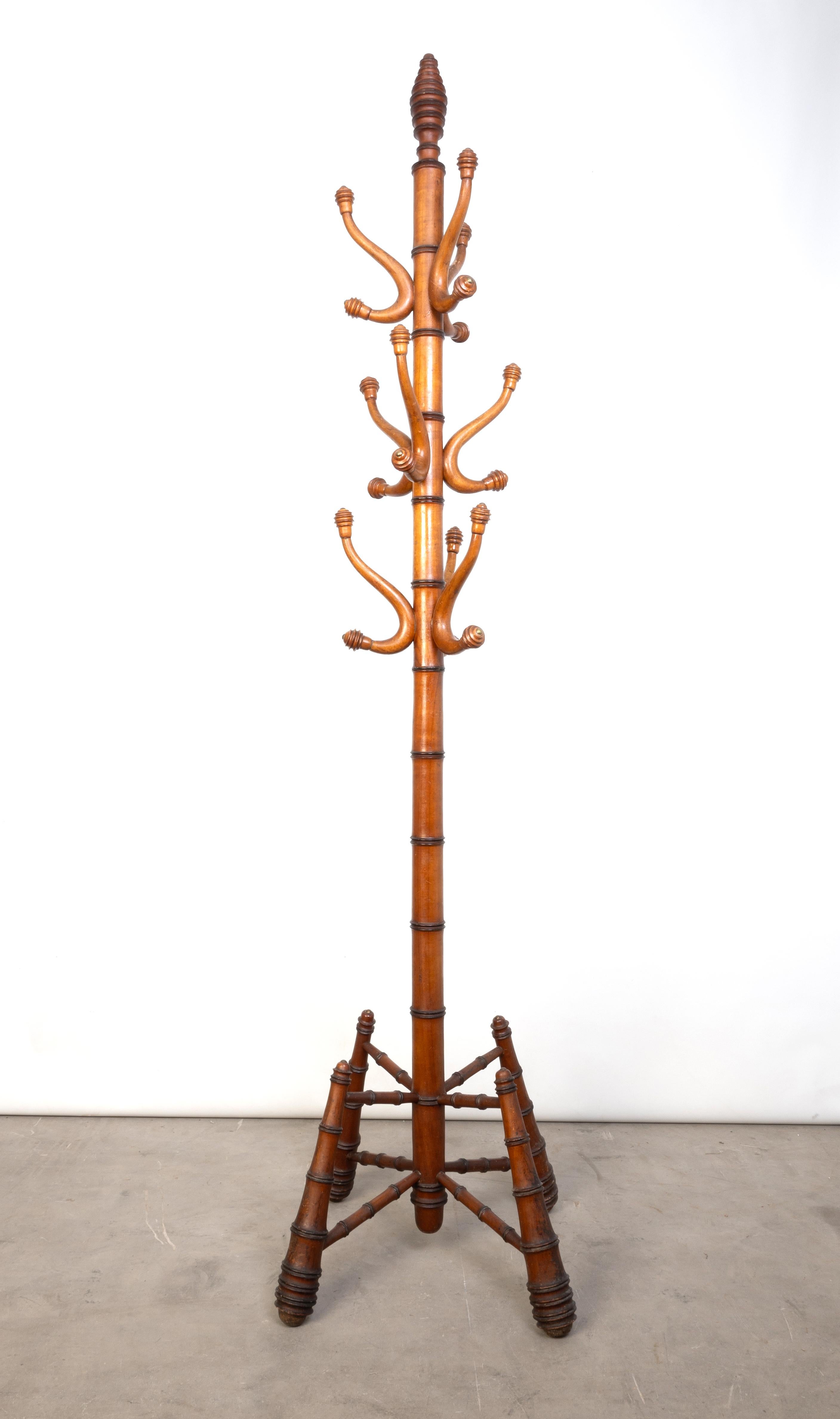 Antique French 19th Century Faux Bamboo Coat/Hat Stand C.1880

Very attractive example. In good solid and sturdy condition.