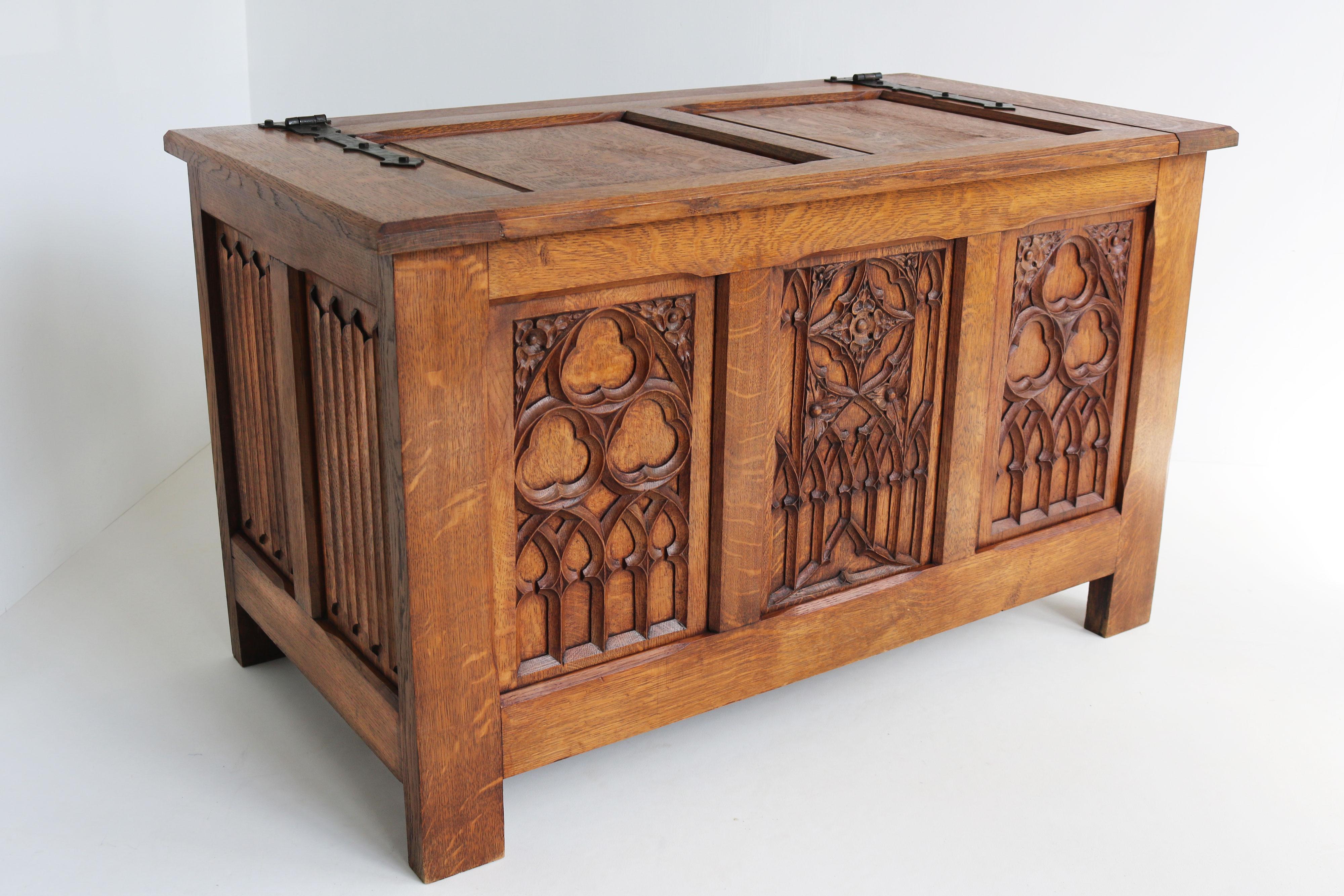 Breathtaking & Practical! This 19th century French Gothic revival blanket chest / chest.  Made out of solid European oak, fully hand carved with much attention to detail & exceptional craftsmanship by a master carver. With gorgeous pair of hand
