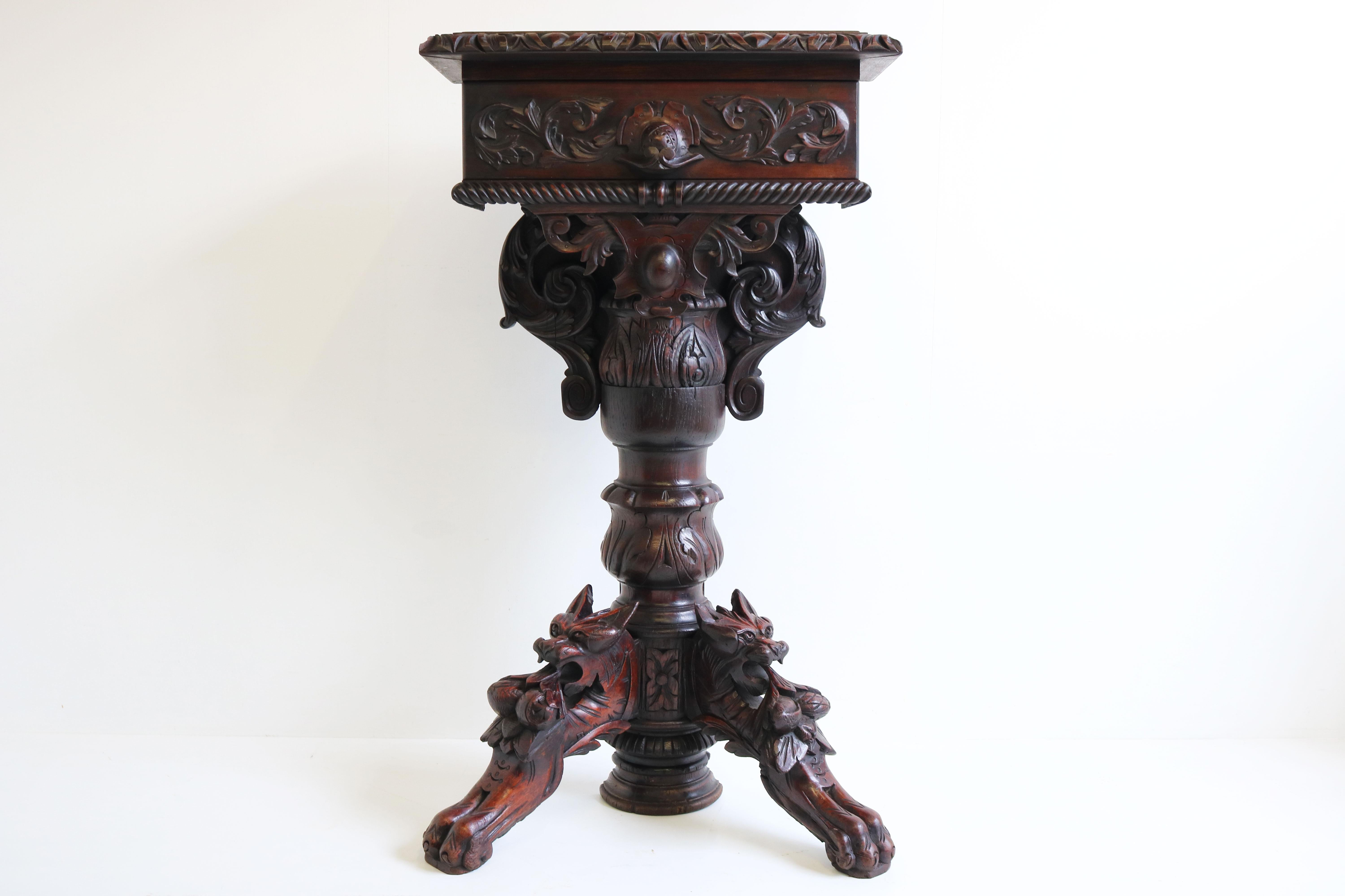Amazing quality & attention to detail ! This 19th century French Hunt console / wall table with drawer & fox head base circa 1870. 
The console has been richly carved by a master carver out of solid oak and just grabs your attention the entire