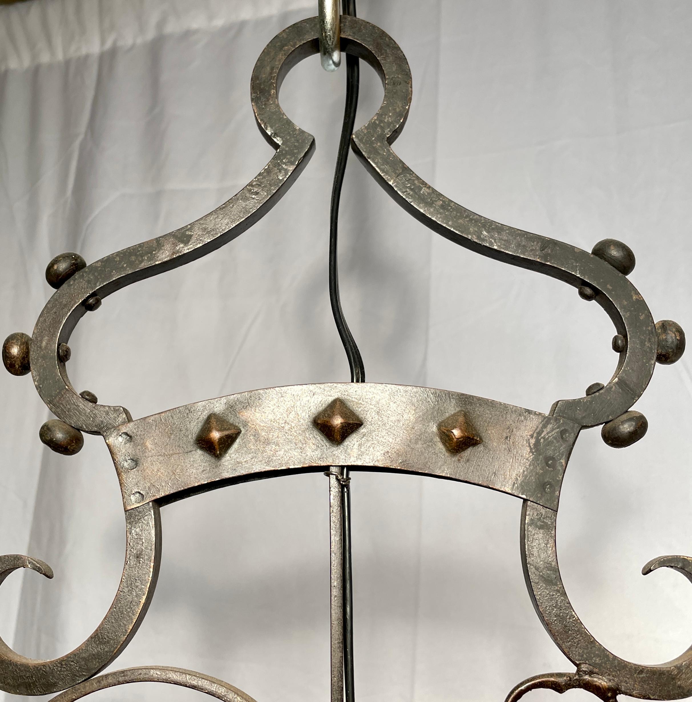 Antique French 19th century iron coat of arms chandelier, Circa 1880.