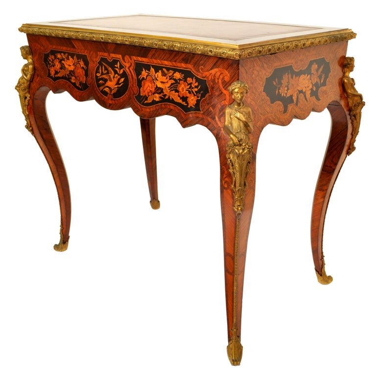 Superb antique French cross-banded walnut & fruitwood writing table with marquetry inlay and ormolu mounts, attributed to Francois Linke, Circa 1895.
The desk is of the highest quality with the original tooled & gilded Ox-Blood leather writing