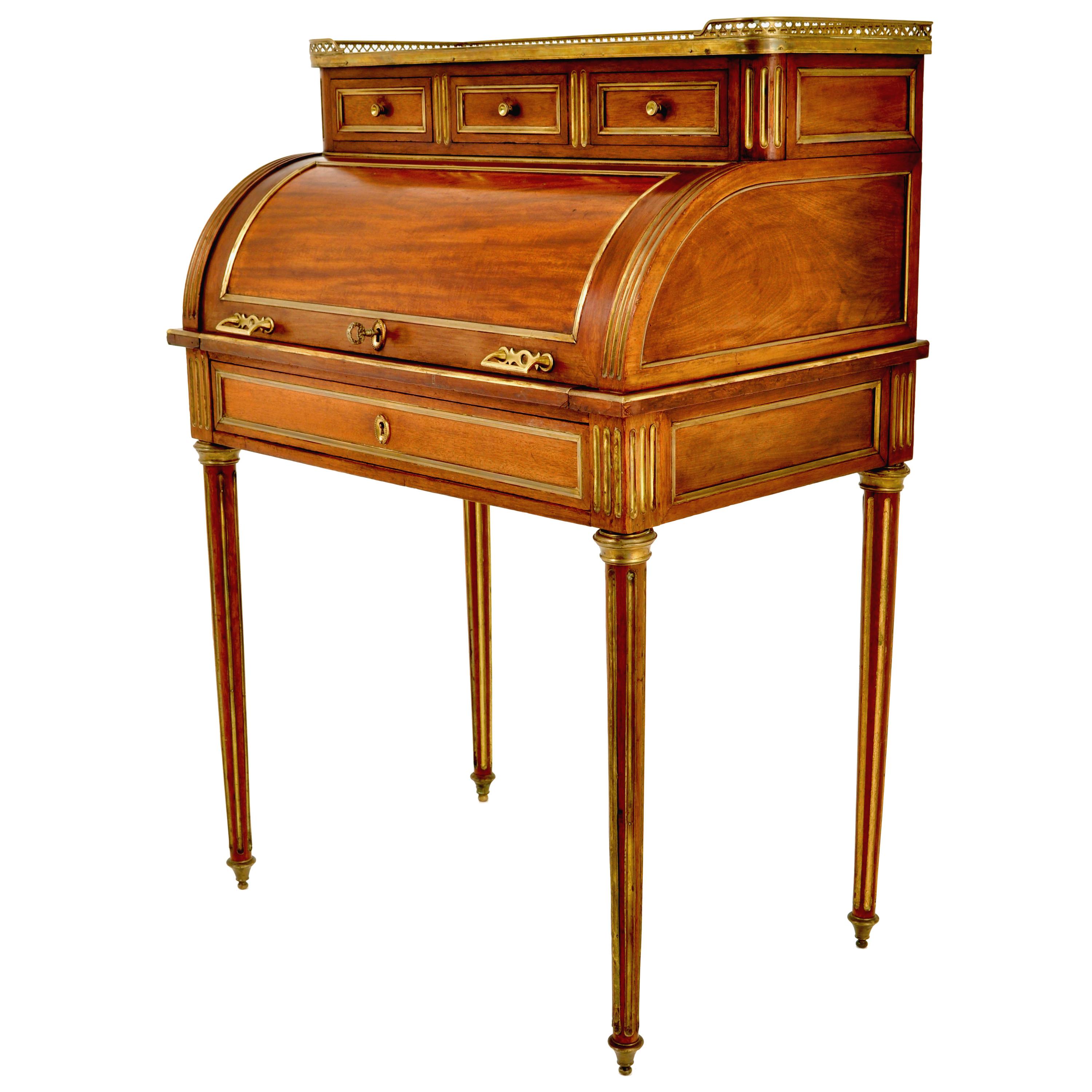 A good quality antique French walnut ladies Louis XVI cylinder/ roll-top writing desk, circa 1880. The desk mounted with gilt bronze and having a pierced 'heart-from' gallery to the top, enclosing a white Carrara marble top. The top fitted with