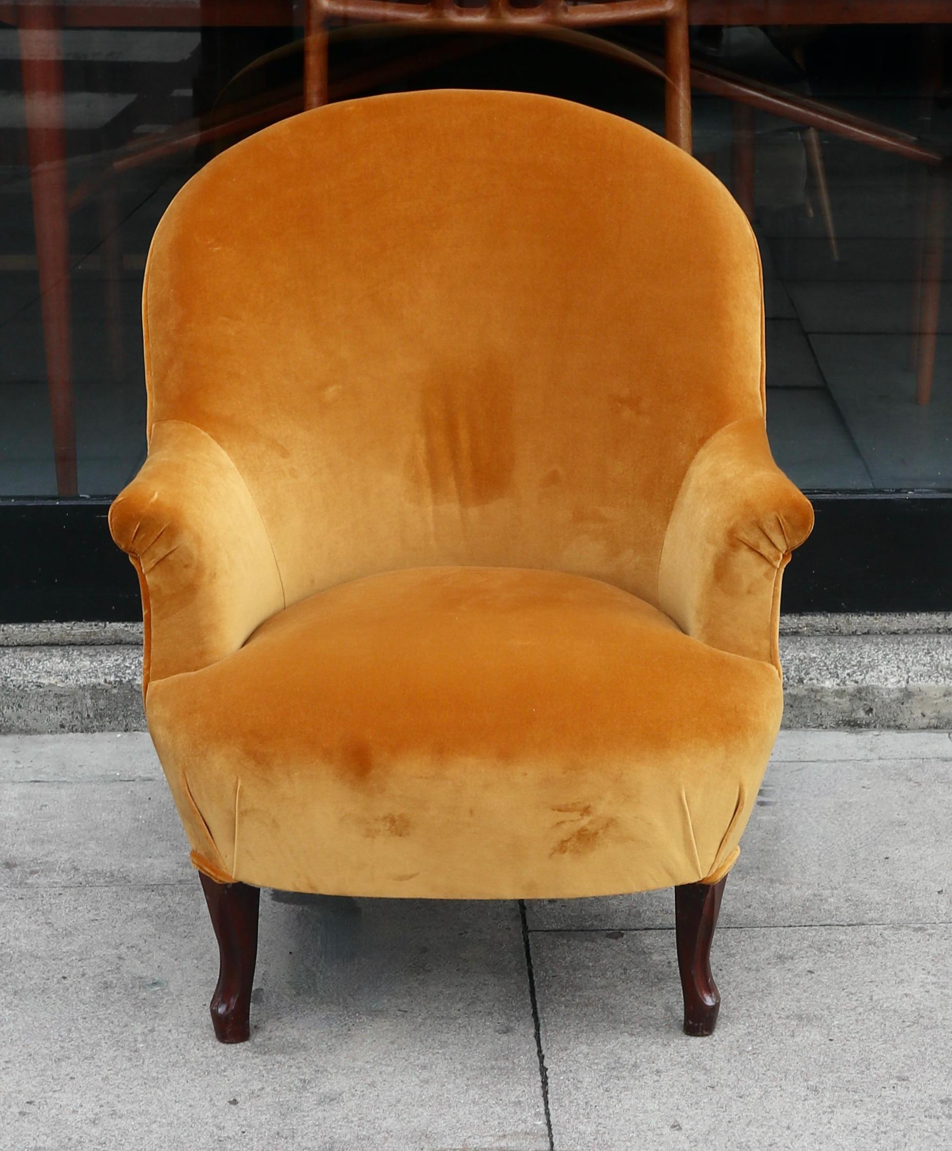 A very beautiful, stylish and extremely comfortable original antique 19th century French, Napoleon III crapaud armchair.  Covered in sand coloured 100% cotton velvet textile on stained carved beech legs. This sofa is in excellent condition, having