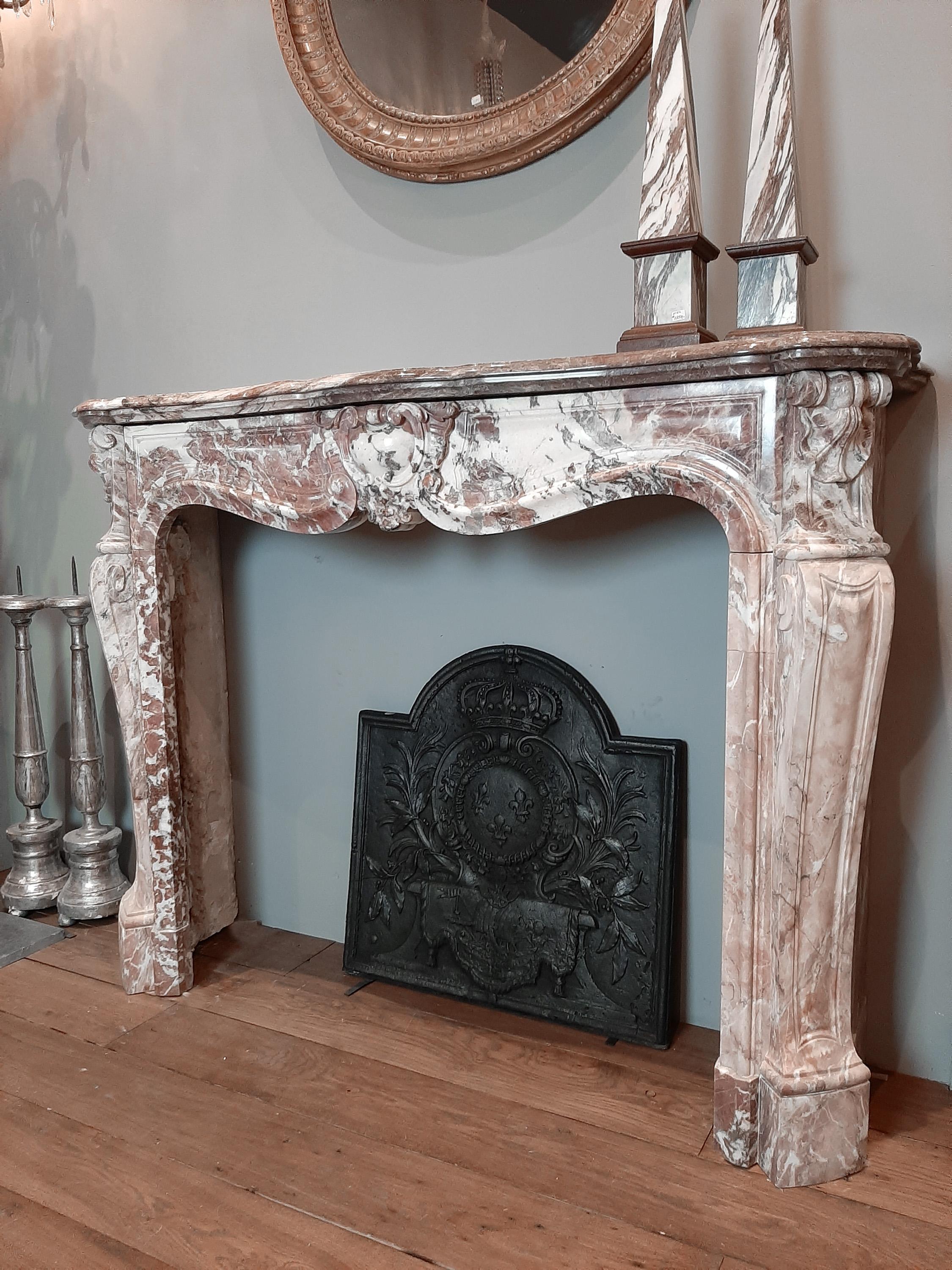 pink marble fireplace