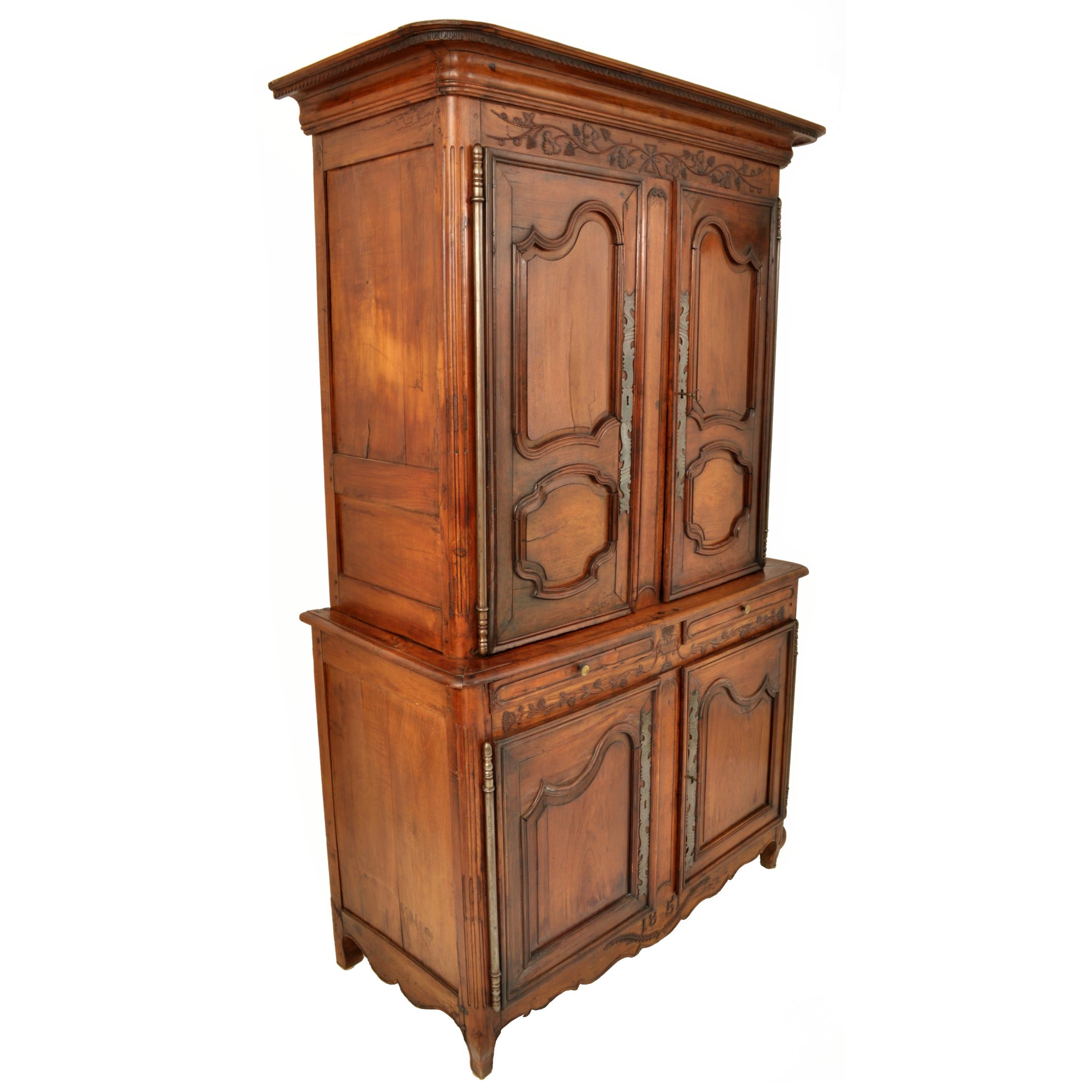 Fine antique 19th century French Provincial fruitwood buffet a' deux corps, dated 1851.
This fine antique buffet was last purchased in 2005 for $20,000, please see the last image for a copy of the sales invoice.
The buffet having a carved stepped