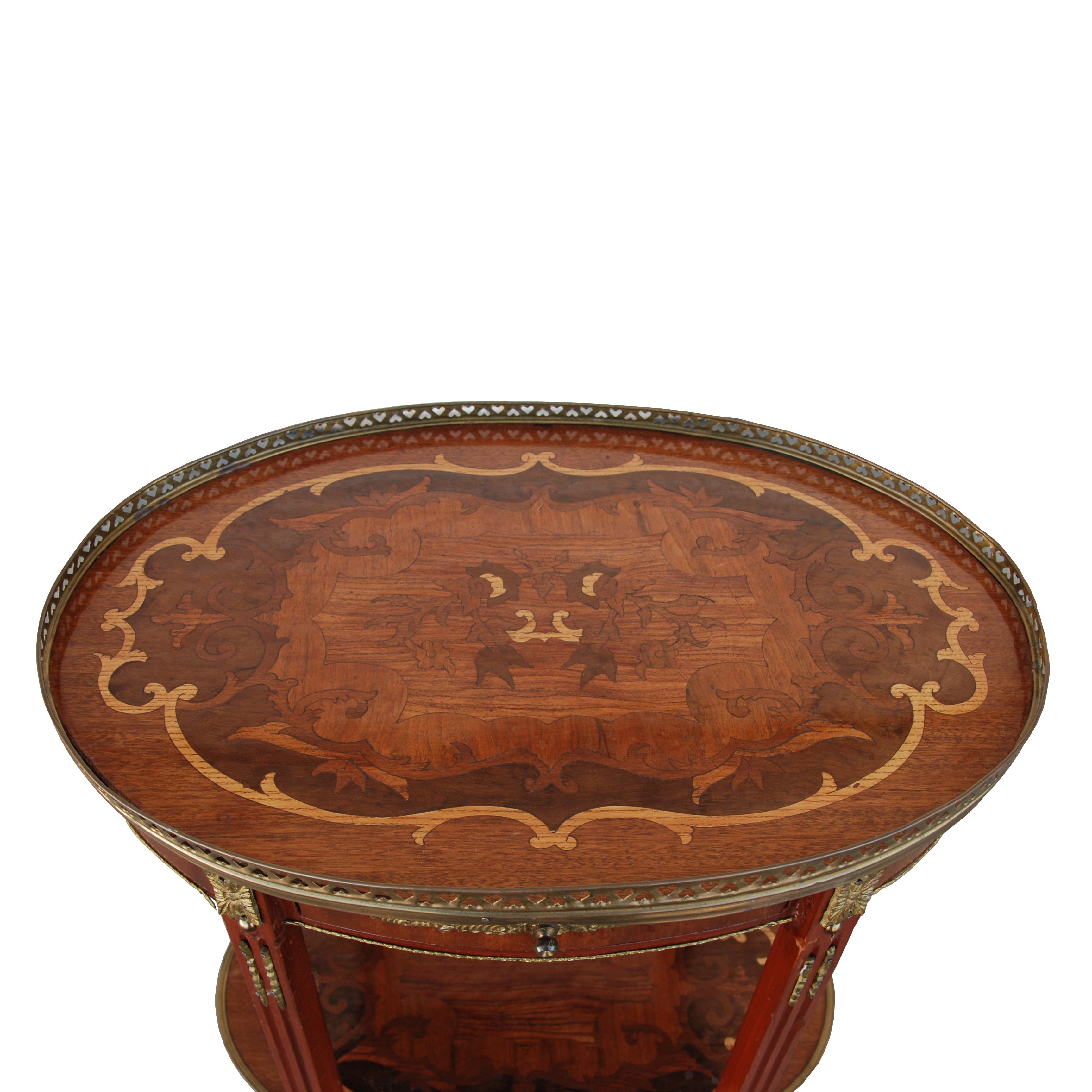 Antique French Art Nouveau Side Table
This piece features intricate marquetry inlays with a beautiful metal gallery edge. Bronze appliques on drawer and legs.

  