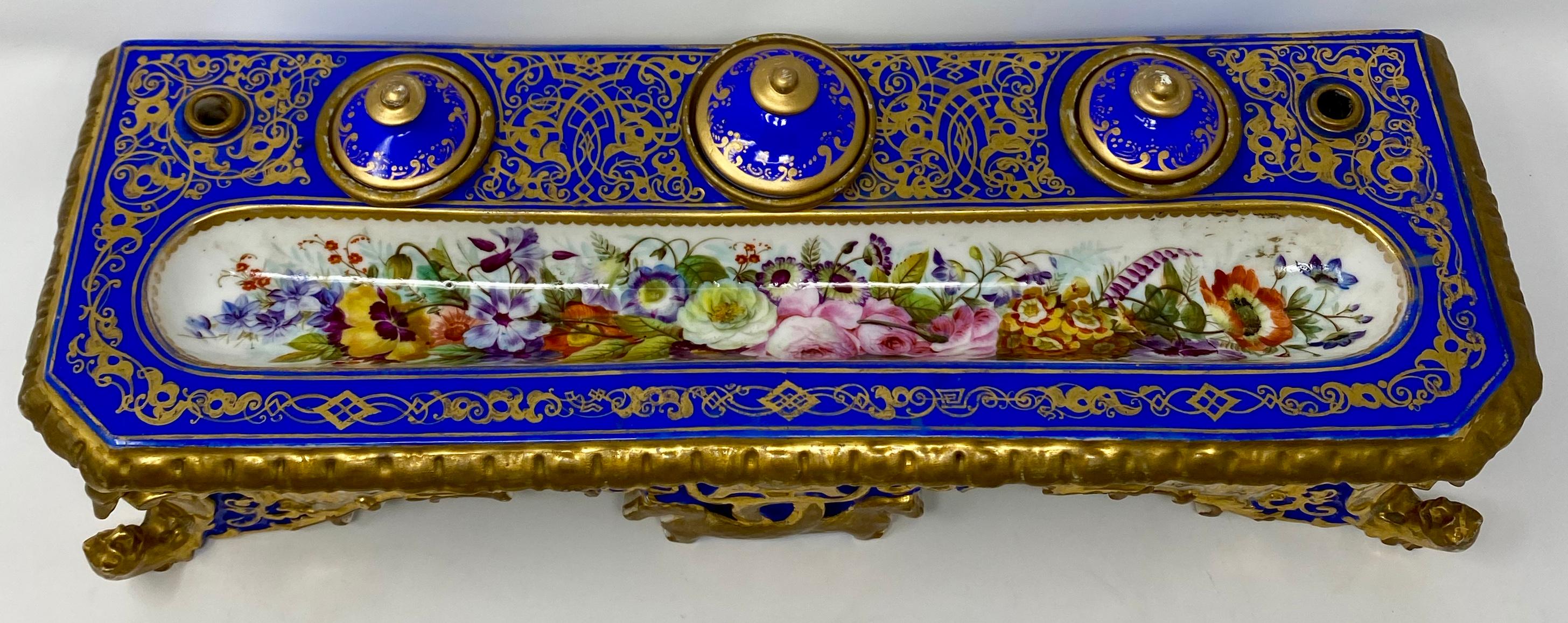 Jacob Petit (1796-1868) was first a porcelain painter in the Sevres factory and then opened his own shop, where decorative porcelain was made and painted such as the inkwell shown here.