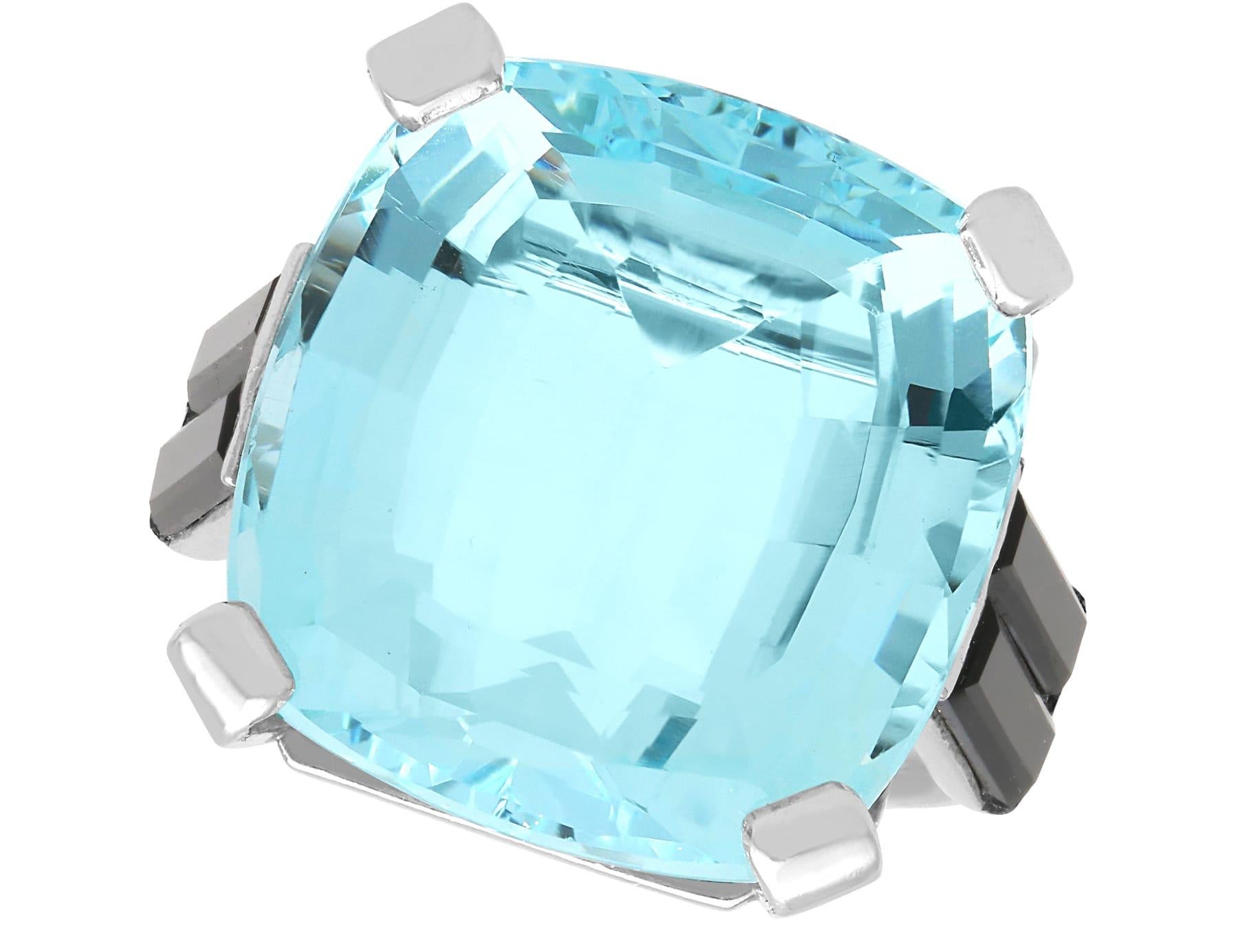 Antique French 21.02 Carat Aquamarine 1.90 Carat Onyx Platinum Ring Circa 1920 For Sale