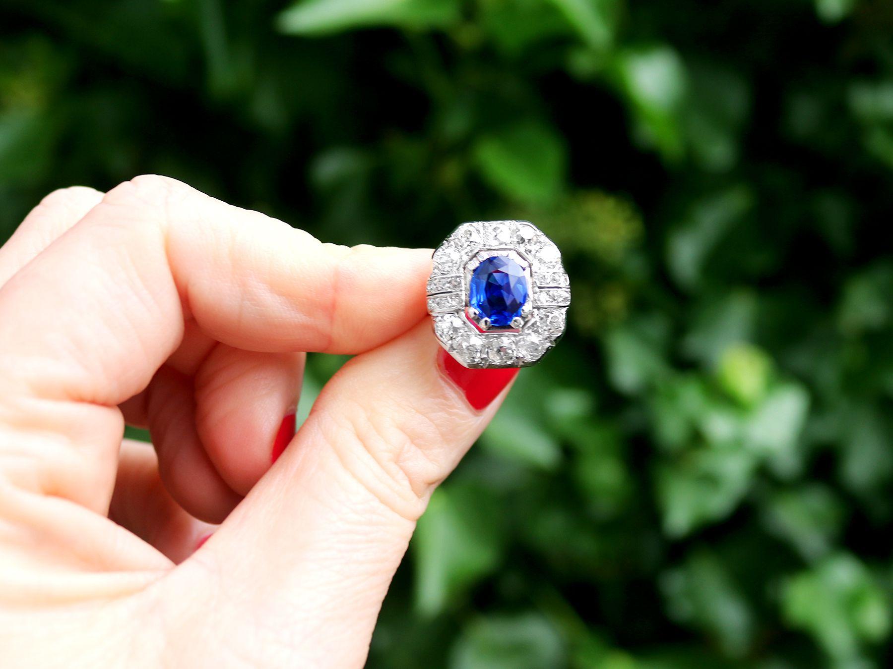 A stunning and impressive antique French 2.20 carat Madagascar sapphire and 2.16 carat diamond, 18 karat white gold cluster ring; part of our diverse gemstone jewelry collections.

This stunning, fine and impressive antique sapphire cluster ring has