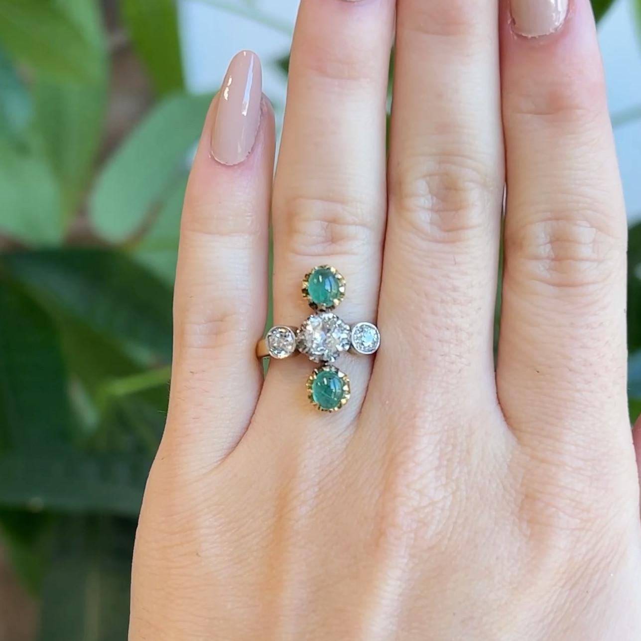 One Antique French Old Mine Cut Diamond Emerald 18 Karat Yellow Gold Ring. Featuring one old mine cut diamond of approximately 0.40 carats, graded in the mounting as J color, SI clarity. Accented by two old European cut diamonds with a total weight