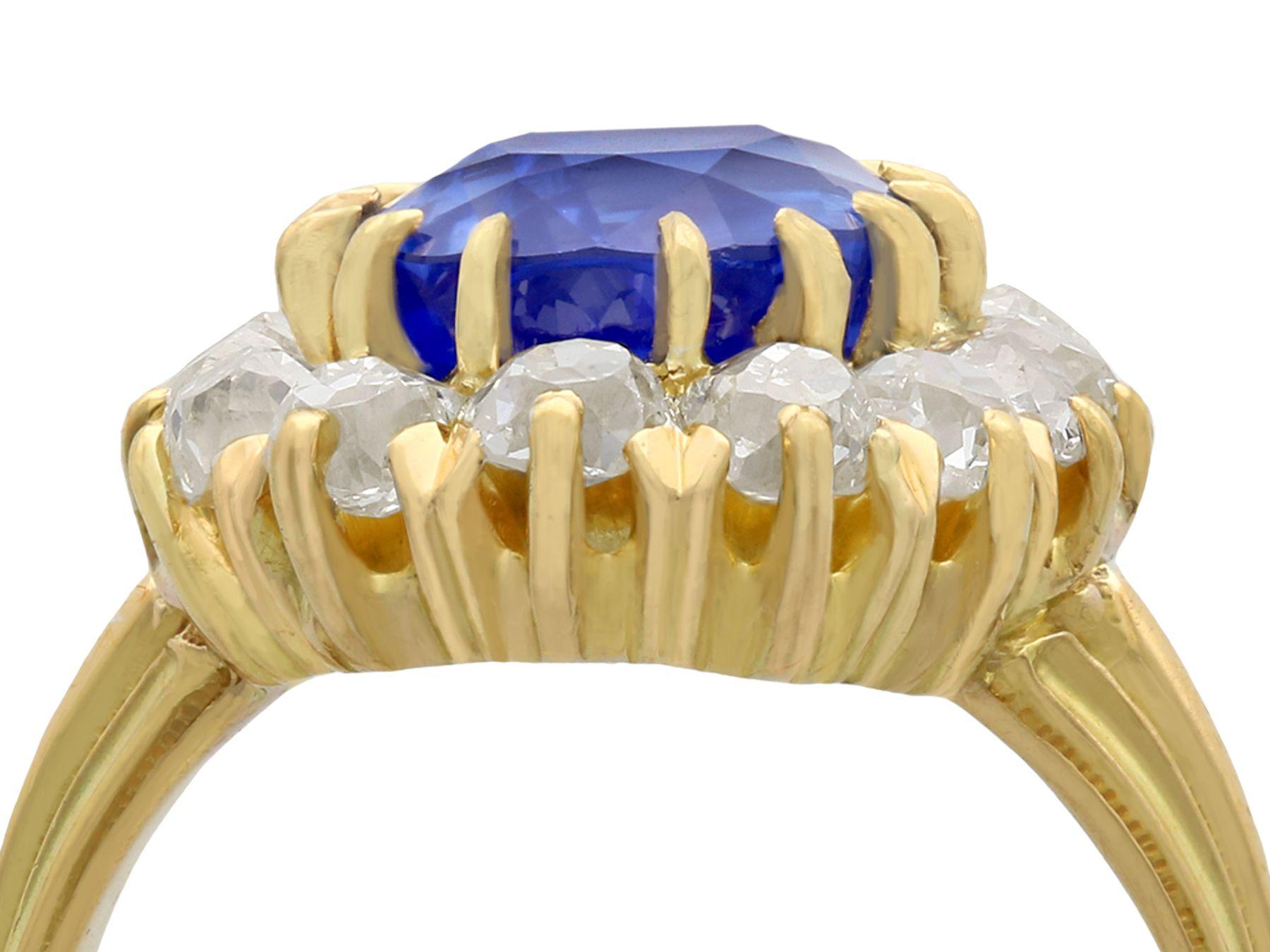 A stunning antique French 4.81 carat sapphire and 1.26 carat diamond, 18 karat yellow gold cluster ring; part of our diverse antique jewelry and estate jewelry collections.

This stunning, fine and impressive antique sapphire and diamond ring has