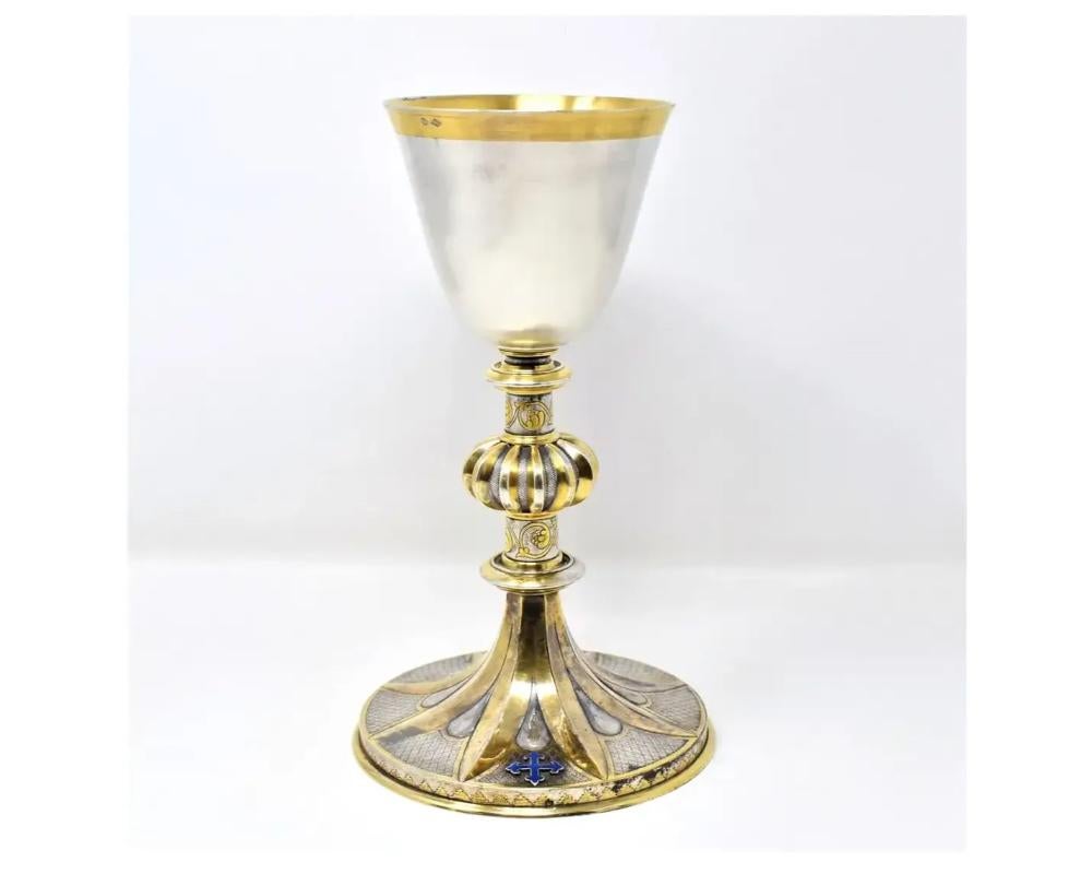 An antique 19th century French solid .950 silver, gilt silver and enamel chalice. Marked in two places with French Minerva high grade silver hallmark ( for 950/1000 silver) as well as maker's mark of Placide Poussielgue-Durand (1847-1891, Paris).