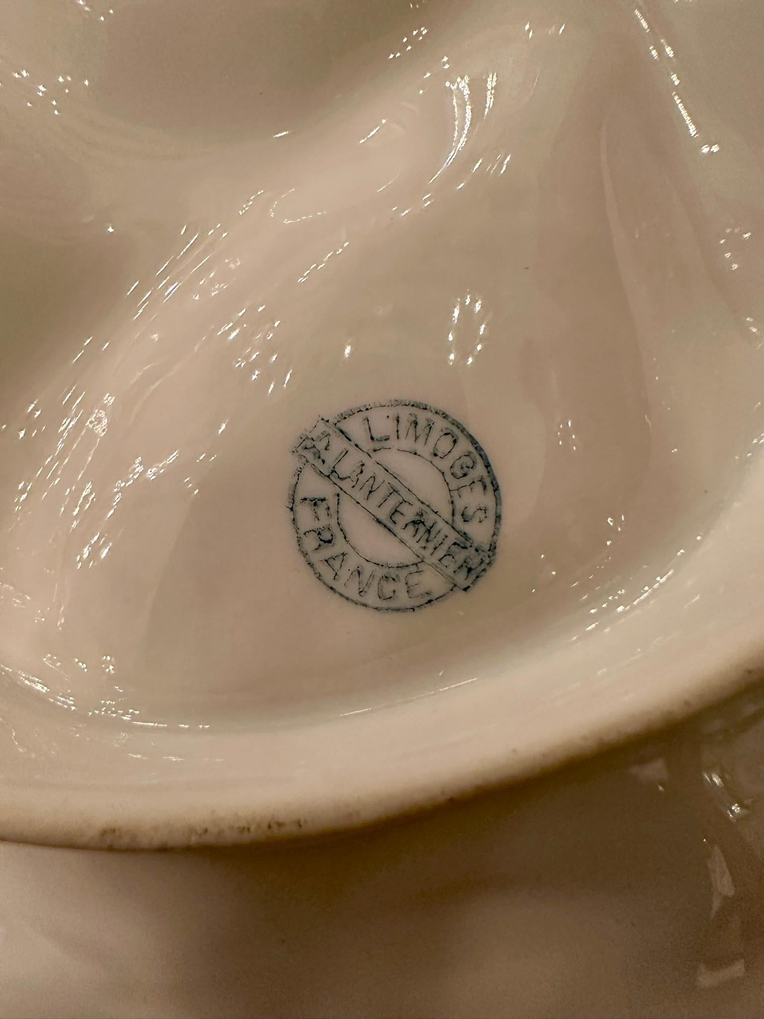 Antique français « A. L. » Assiette à huîtres jaune et or en porcelaine de Limoges, vers 1890. 1
