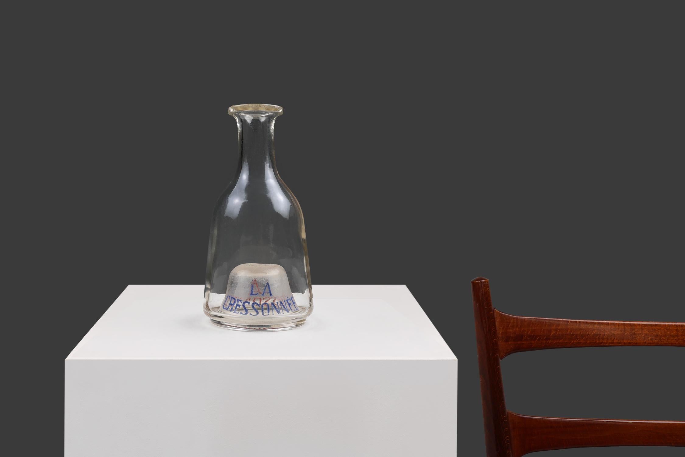 France / 1900 / carafe / La Cressonnée / glass / Mid-century / Vintage

Rare and beautiful antique Absinthe carafe with magnifying frosted glass base. Marked “La Cressonnée” in red and bleu. Capacity: 0.6 liters.

Absinthe is a spirit made from
