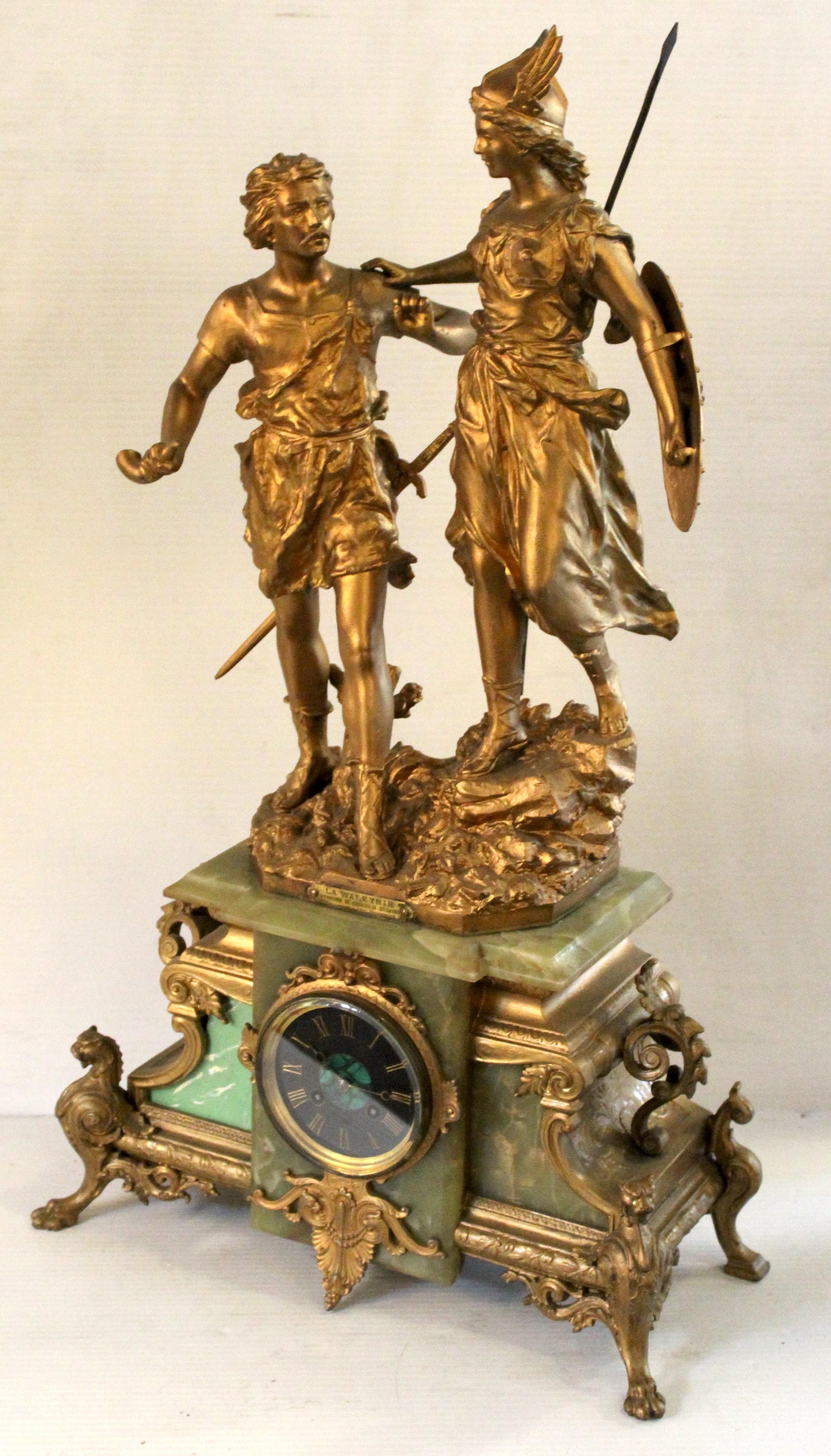 Magnificent French figural alabaster mantel clock titled “La Walkyrie” by acclaimed sculptor Ernest Rancoulet. Crafted in the late 19th to early 20th century, this richly detailed piece features a dynamic depiction of the 