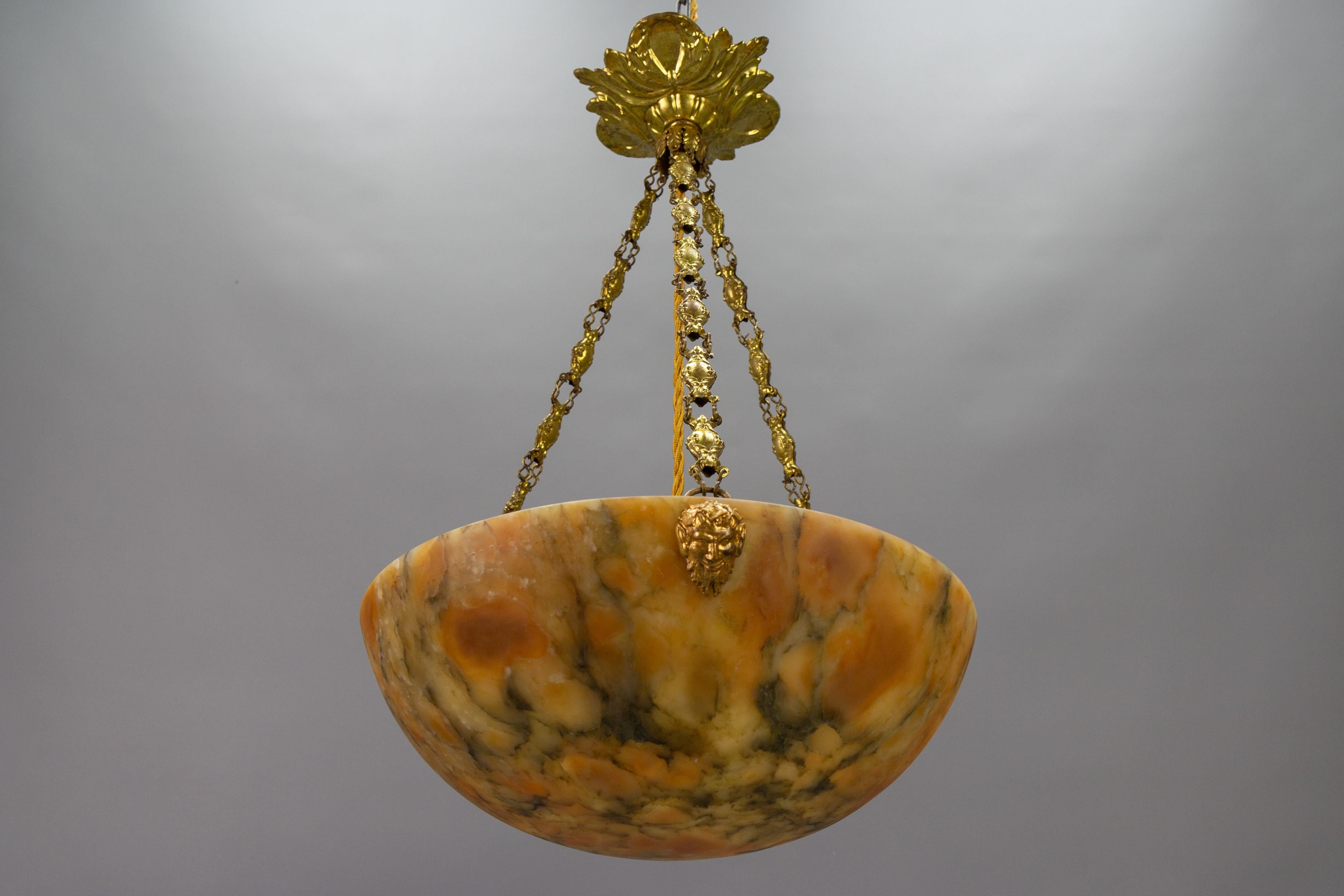 Neoclassical Antique French Amber Color Alabaster and Brass Pendant Light, circa 1920 For Sale