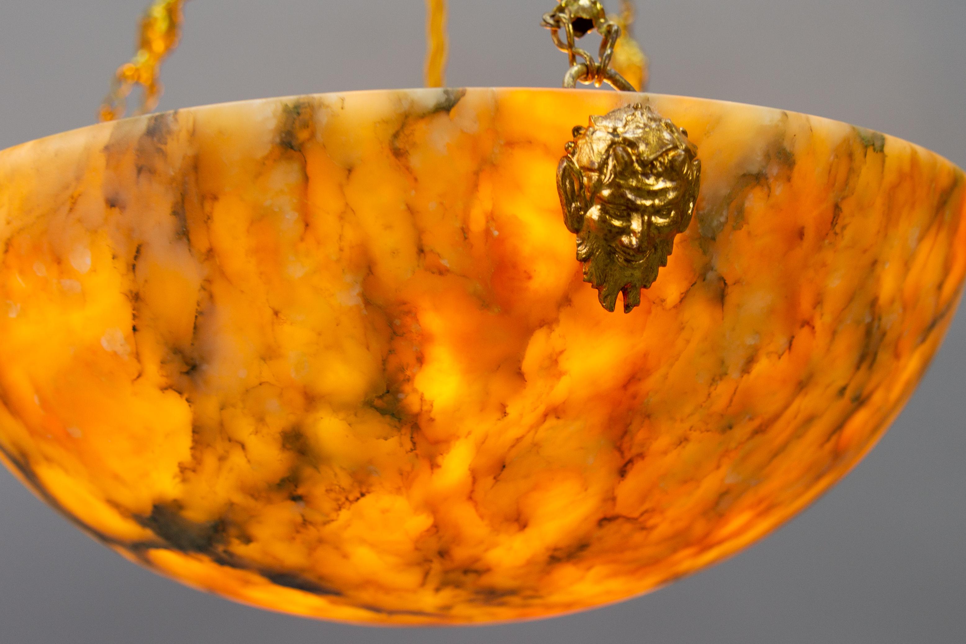 Early 20th Century Antique French Amber Color Alabaster and Brass Pendant Light, circa 1920 For Sale