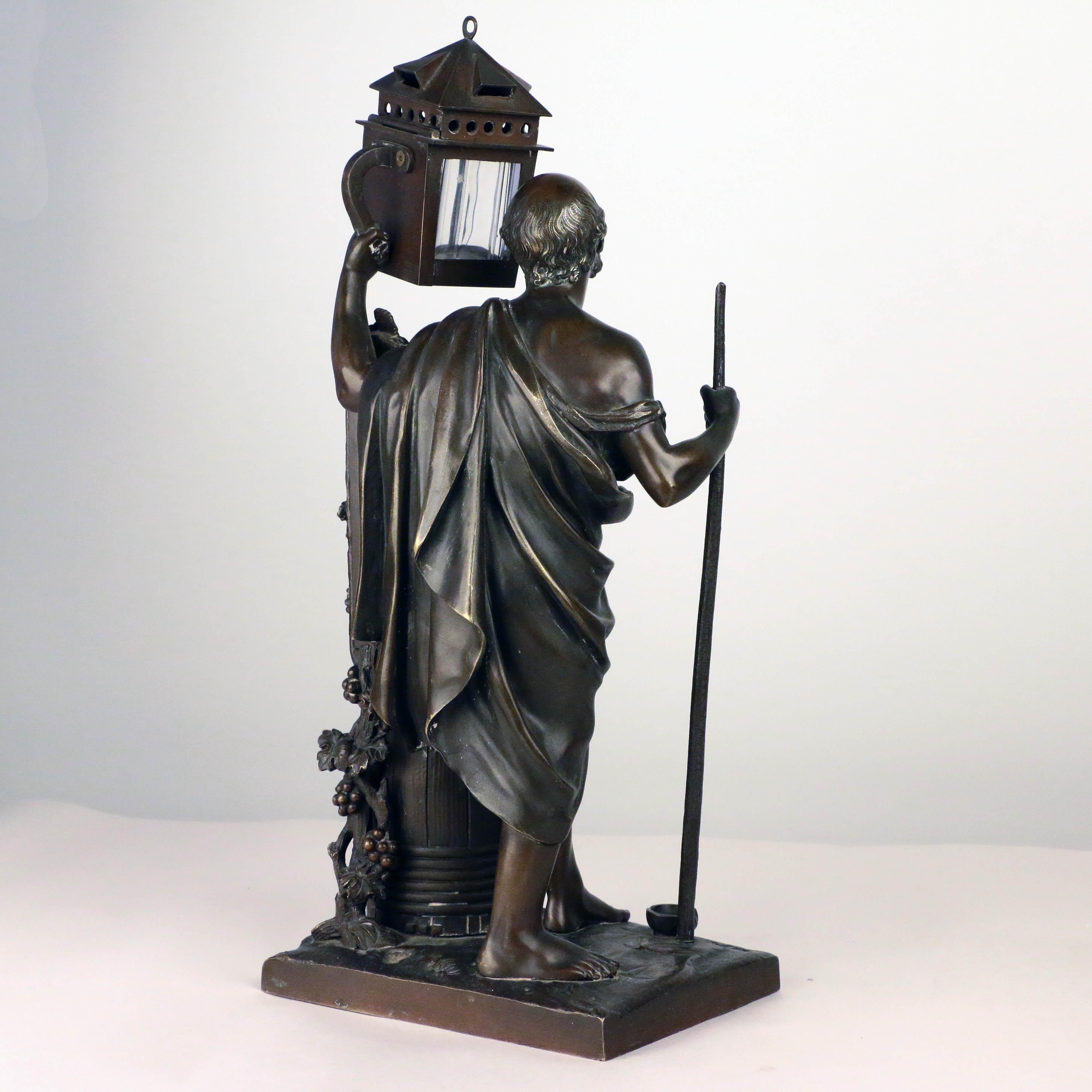 Cast Antique French Amusing Bronze Figure of Diogenes, a Desk Set