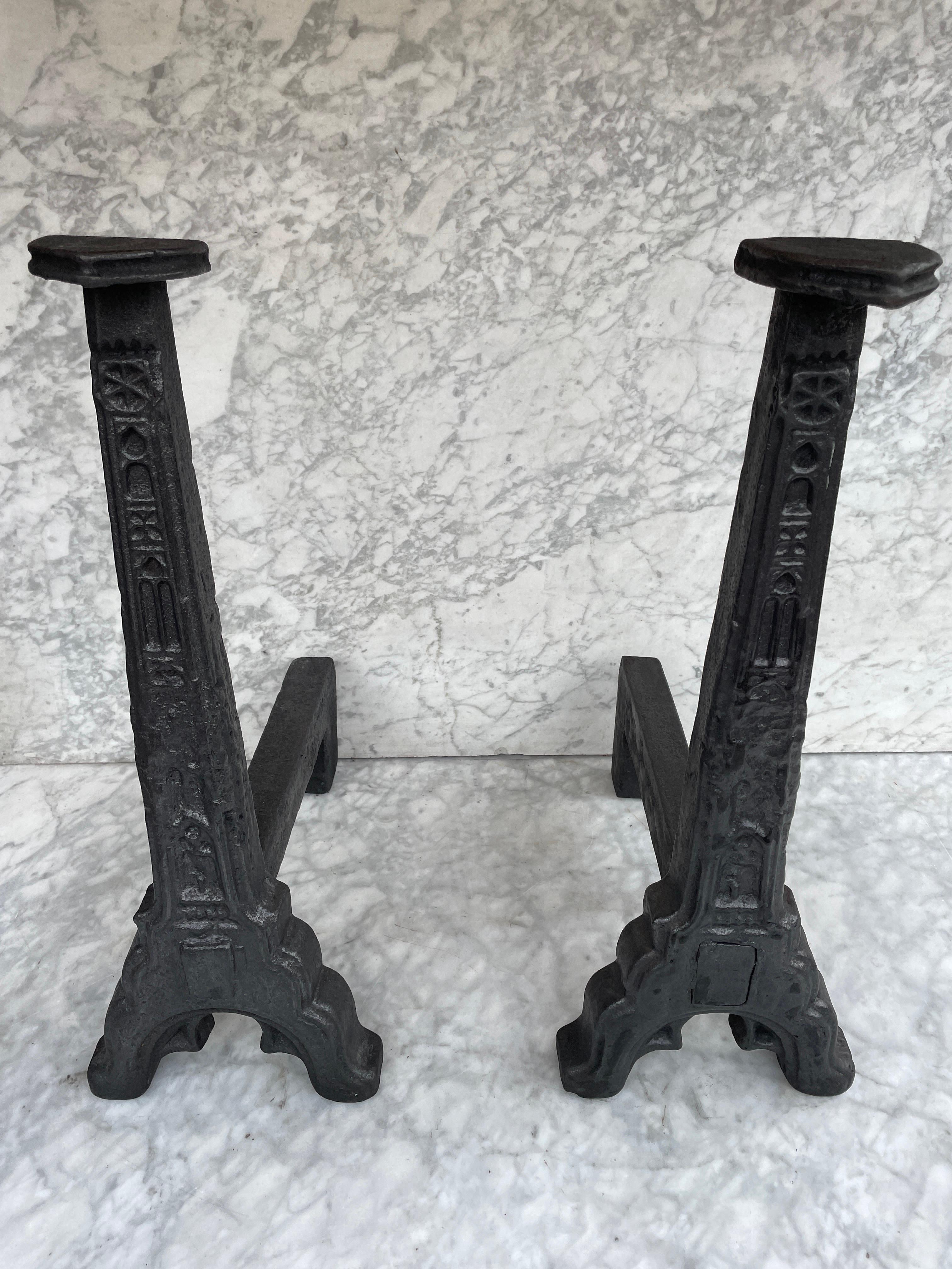 Antique French andirons or firedogs, 19th century
Beautiful set of andirons made from cast iron. The impressive size makes this pair stand out. 
The weight of this pair is about 34 kg for the set.