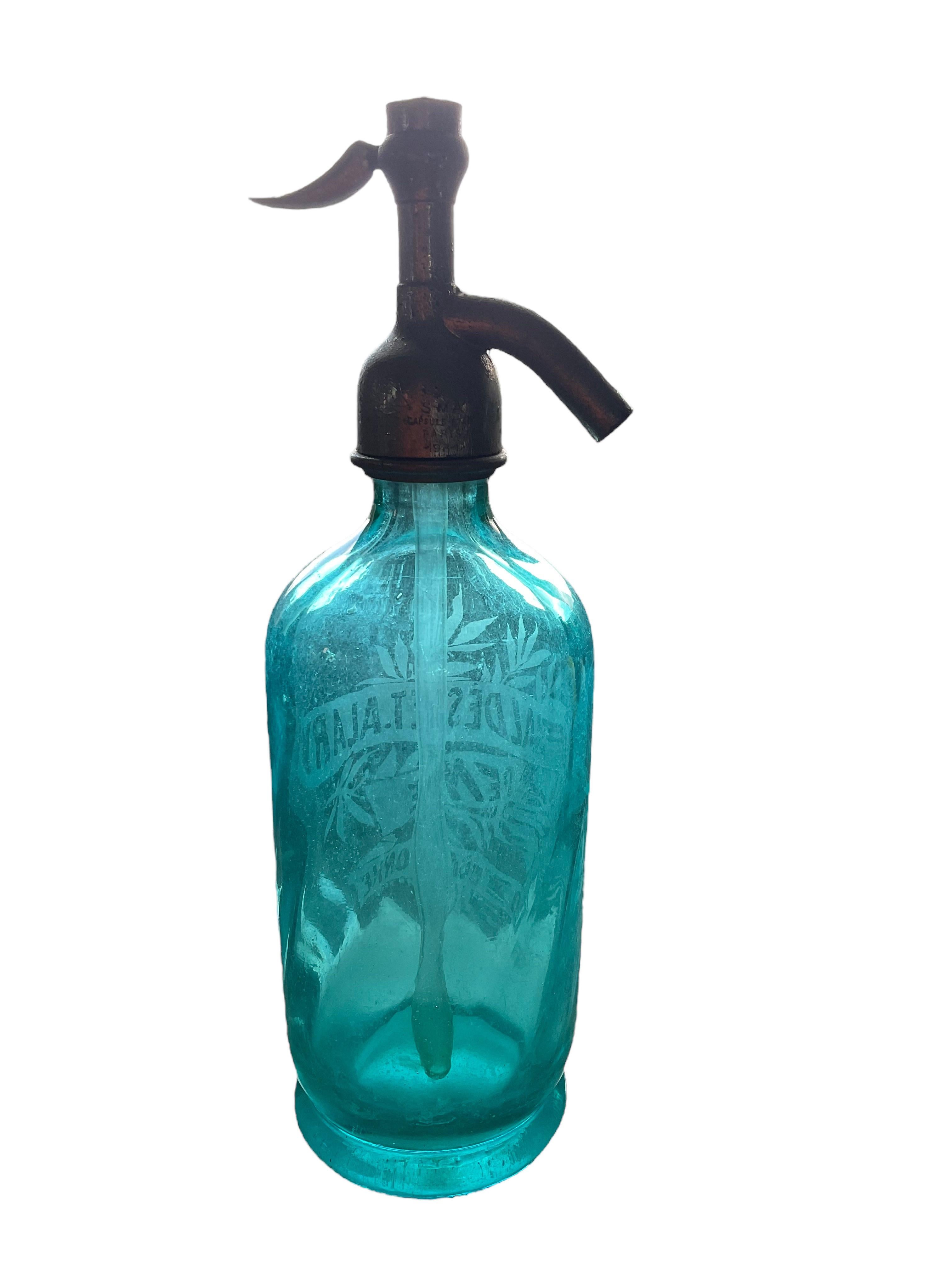 This Antique French Aqua Blue J. Fialdes and ET Alary Soda Bottle measures 10 1/2