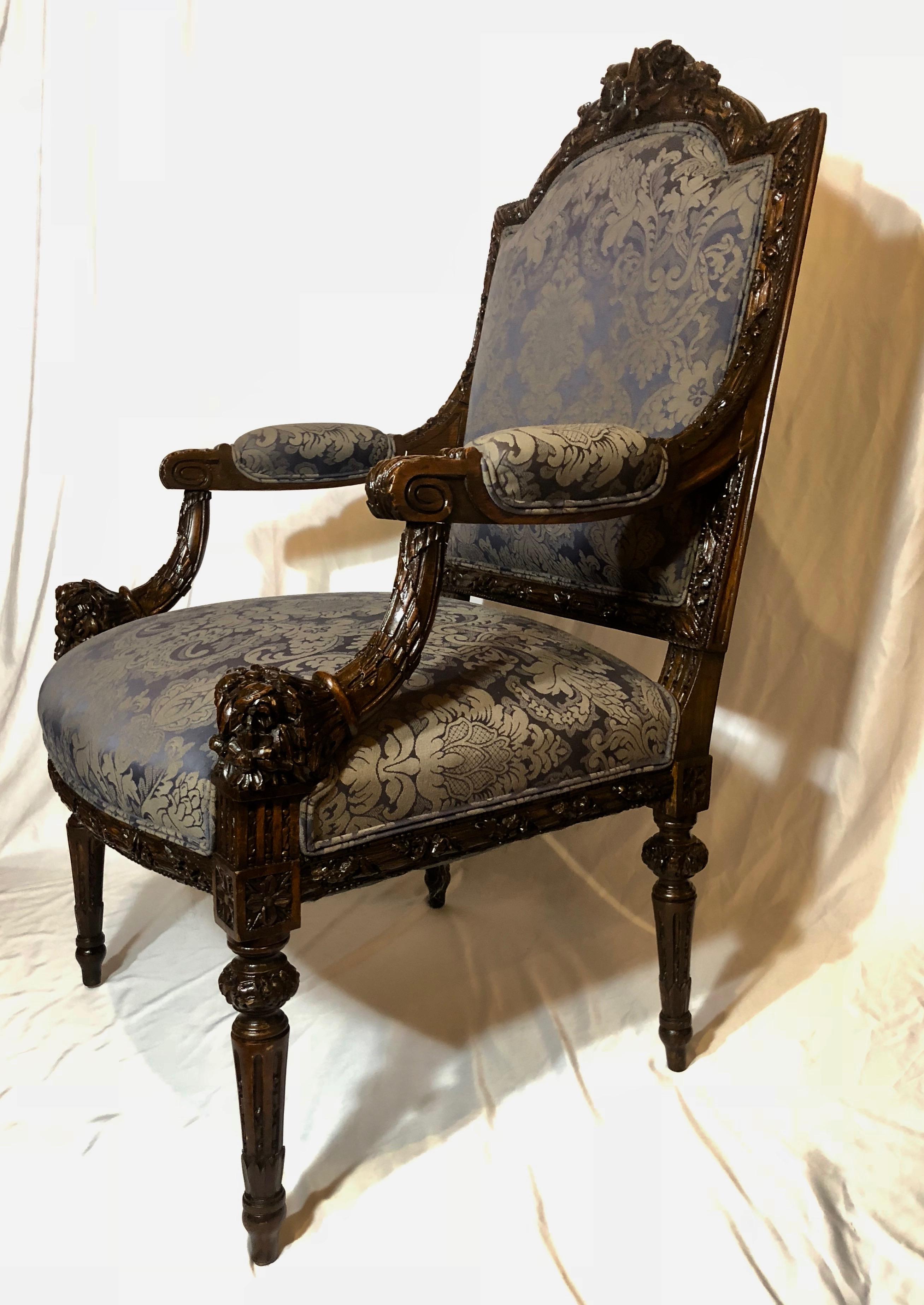 This armchair has very well-defined carving, as well as nice upholstery. 