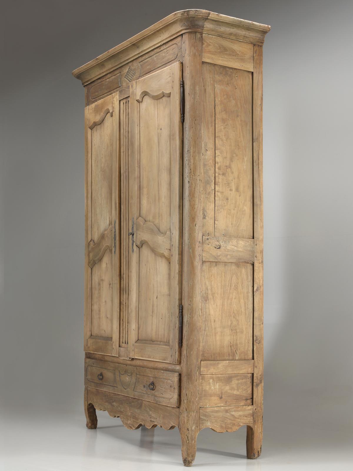 Antique French armoire, in what I would have to describe as a mystery wood. You would think that after 30-years in this business, we could actually identify a French armoire’s wood species, well I am here to tell you, no, we have no idea what it is,