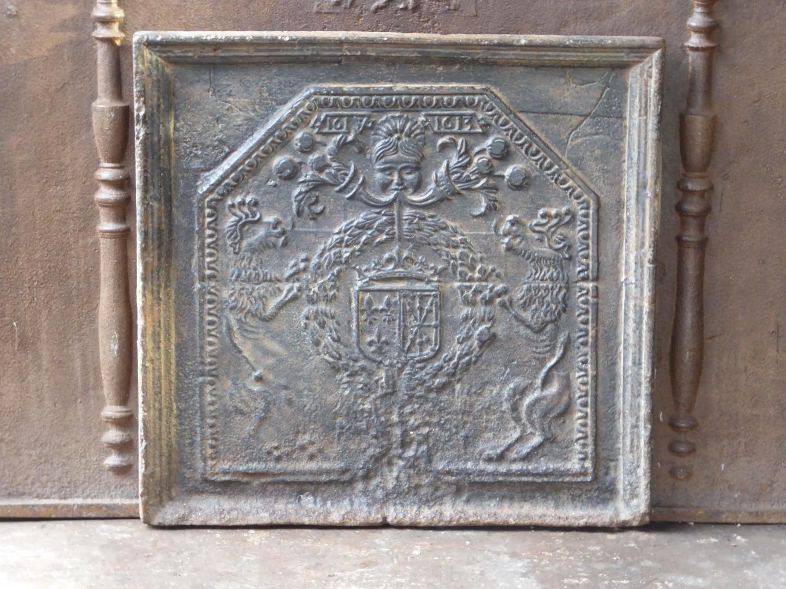 17th century French Louis XIV fireback with the Arms of France and Navarre. 

Arms of the House of Bourbon from France, one of the major royal dynasties of Europe that produced monarchs Spain (Navarre), France, the two Sicilies and Parma. Bourbon