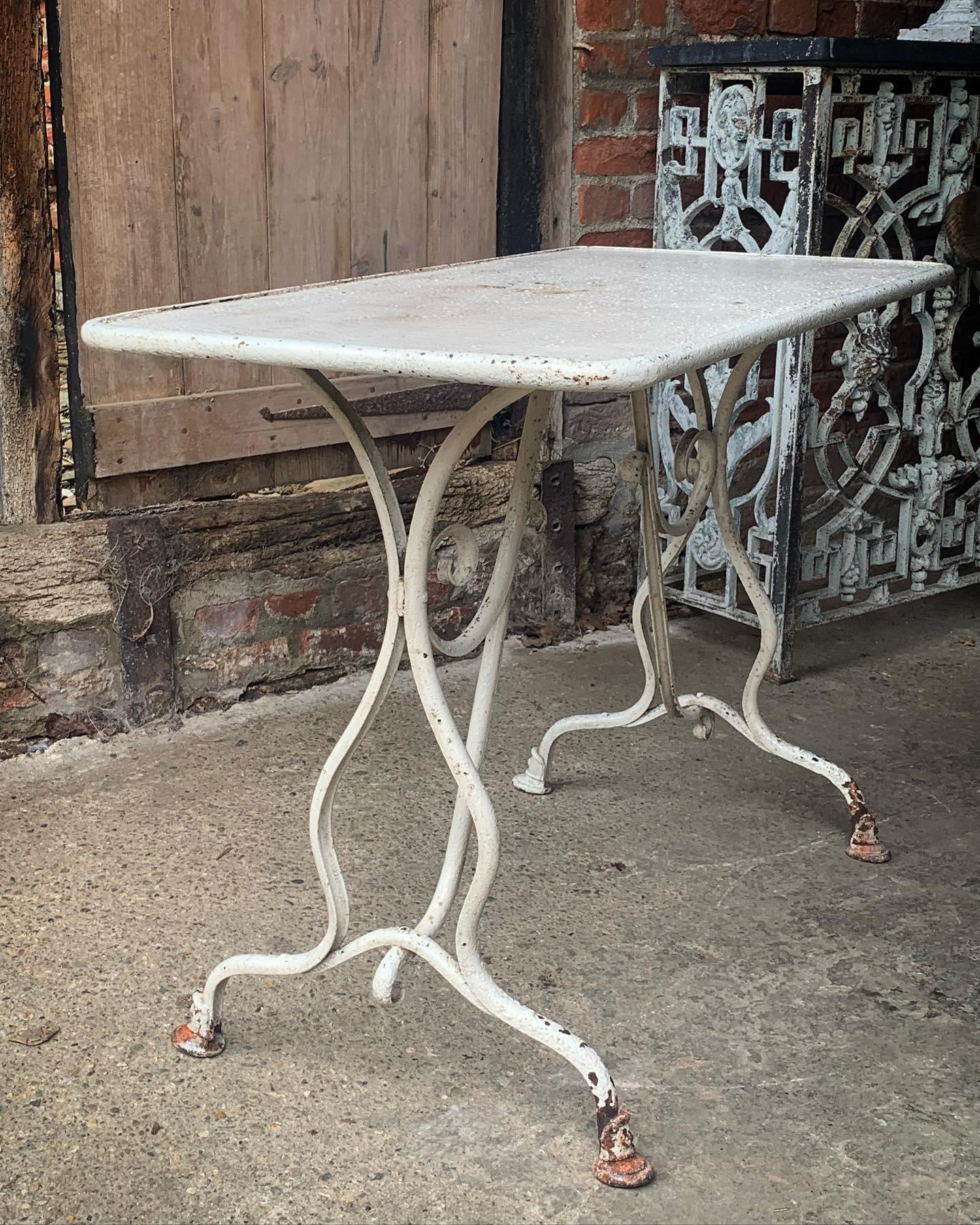 A charming late 19th  early 20th century iron garden table from Arras in northern France. In nice original condition with old weathered paint and Horse hoof feet. Makers badge on rim of table.

Please contact us directly for a worldwide shipping