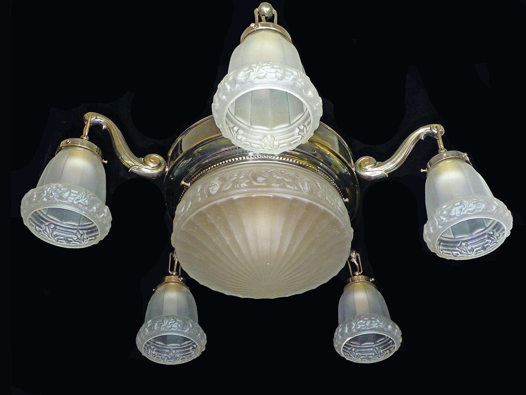 French Degué style Art Deco white frosted glass, six-light brass chandelier/ gold and bronze color metal with age patina.
Six bulbs E27- 60W - porcelain sockets
Good working condition 
Measures: Diameter 27.5 in / 70 cm
Height 43.3 in (19.7 in +