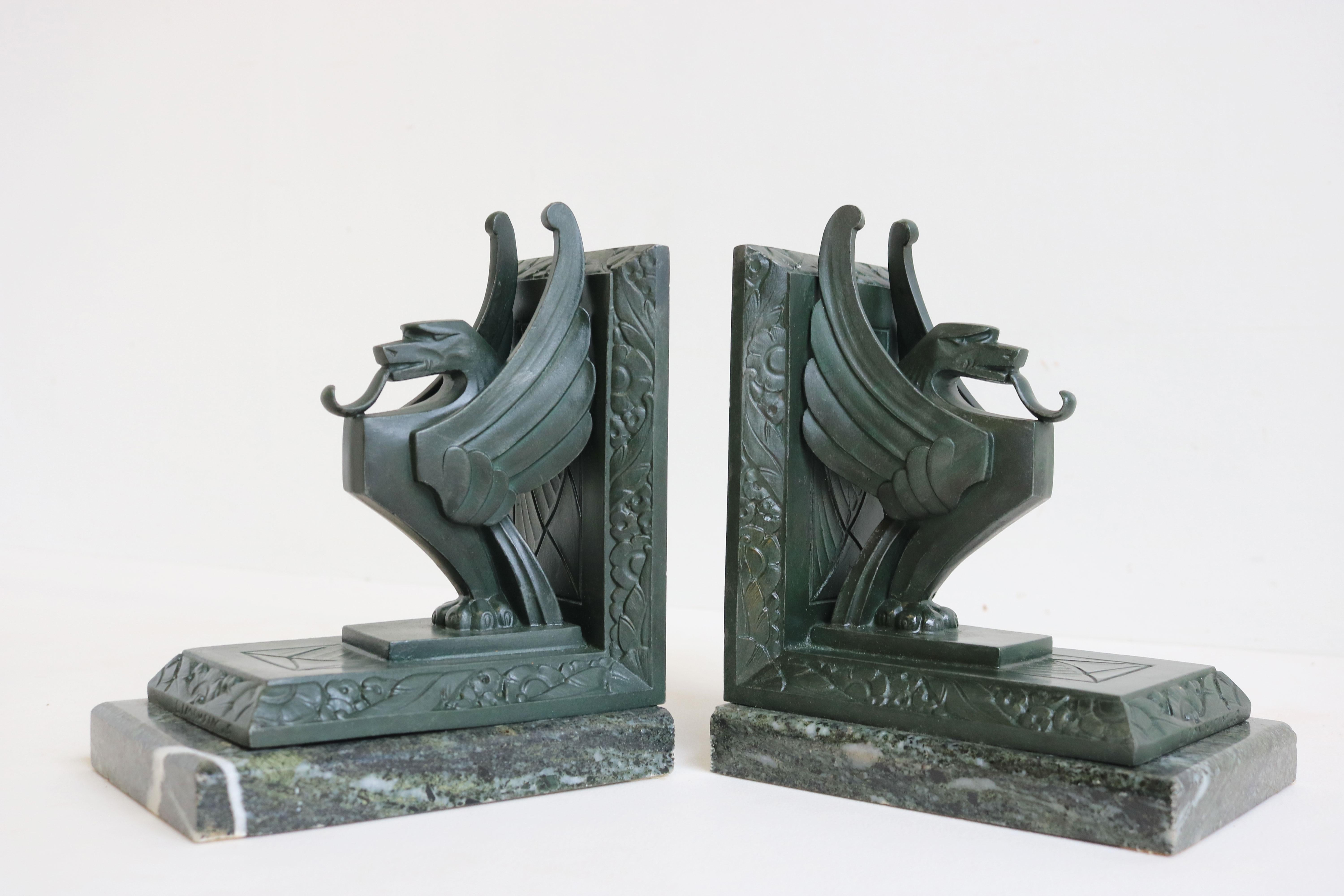 Stunning pair of Art Deco ''Griffins'' bookends by Limousin France 1930. 
Green patinated spelter on a ''Verde Alpi'' green marble base. 
Large model with superb Art Deco design style. 
These leave a lasting impression & provide a unique addition