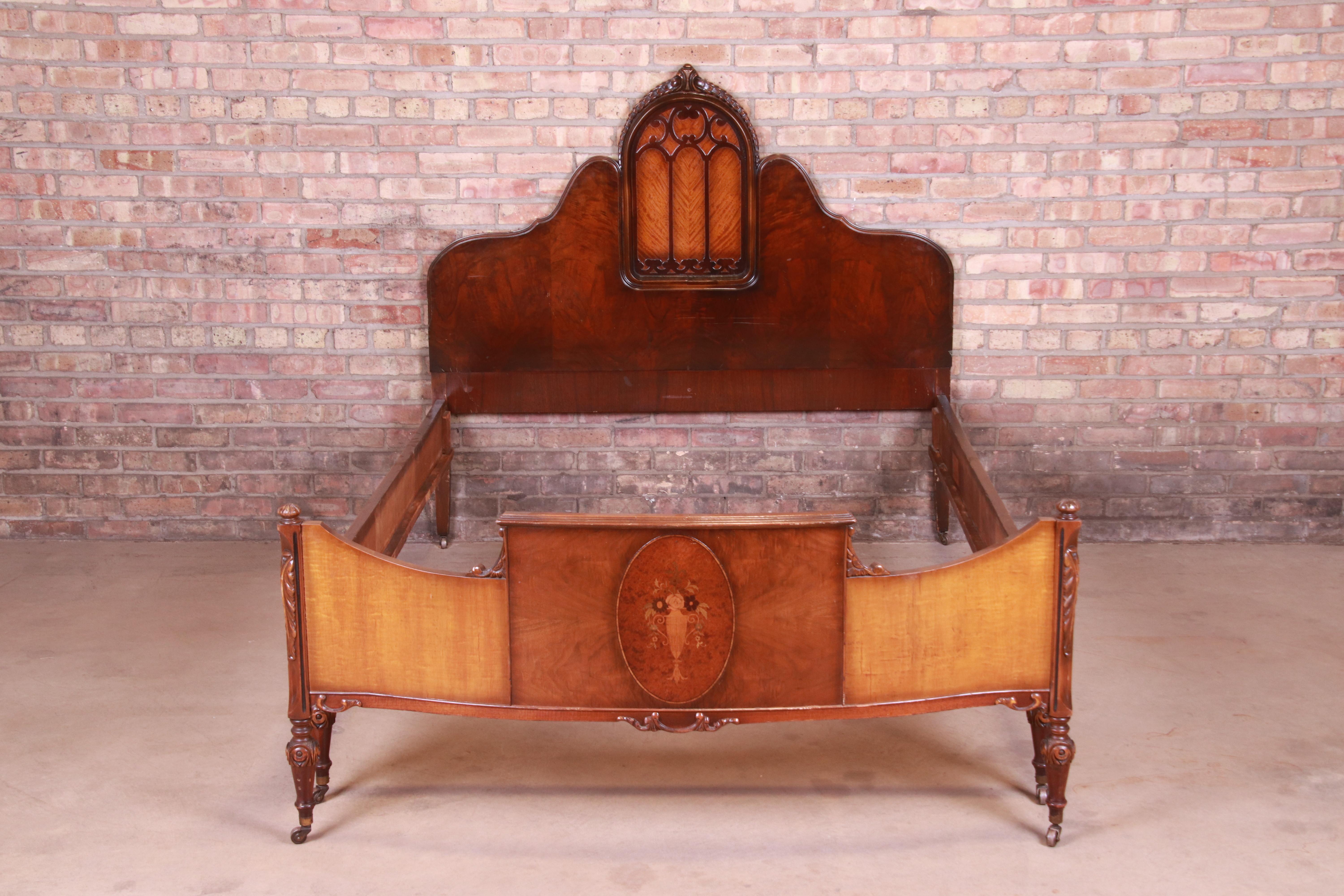 A gorgeous French Art Deco style full size bed frame

By Evansville Furniture Co.,

USA, Circa 1920s

Burled walnut and satinwood, with inlaid floral marquetry.

Measures: 56.5