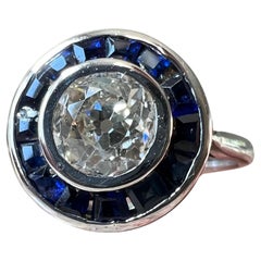 Antiker französischer Art-Déco-Ring aus Platin mit Diamanten, Saphiren und Platin