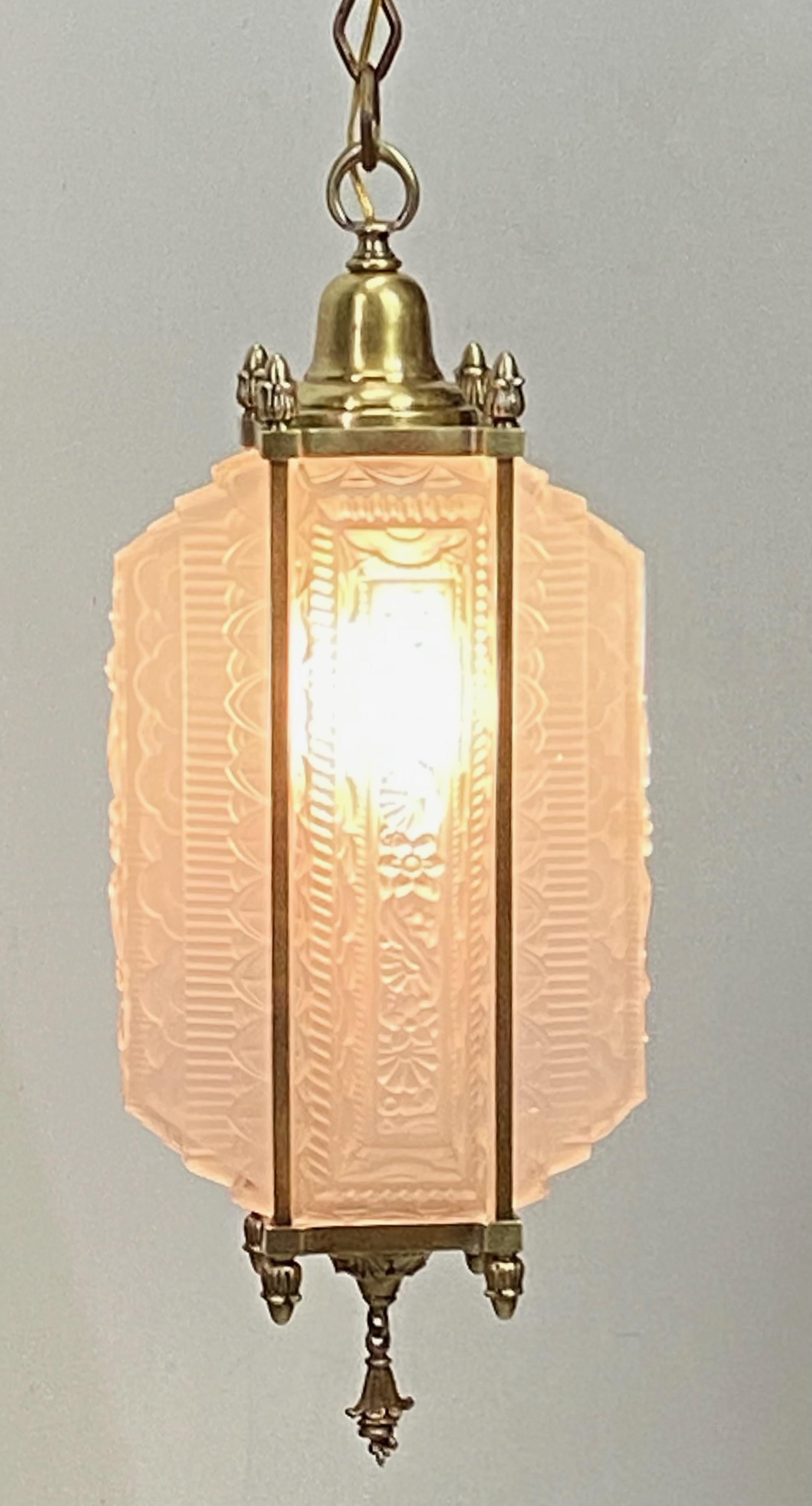 Outstanding Art Deco period glass and brass pendant light fixture in the manner of Rene Lalique. 
France 1920's.
Completely refurbished, cleaned and re-wired. Shown in photo with a 60W LED bulb.
Chain length can be shortened to buyers