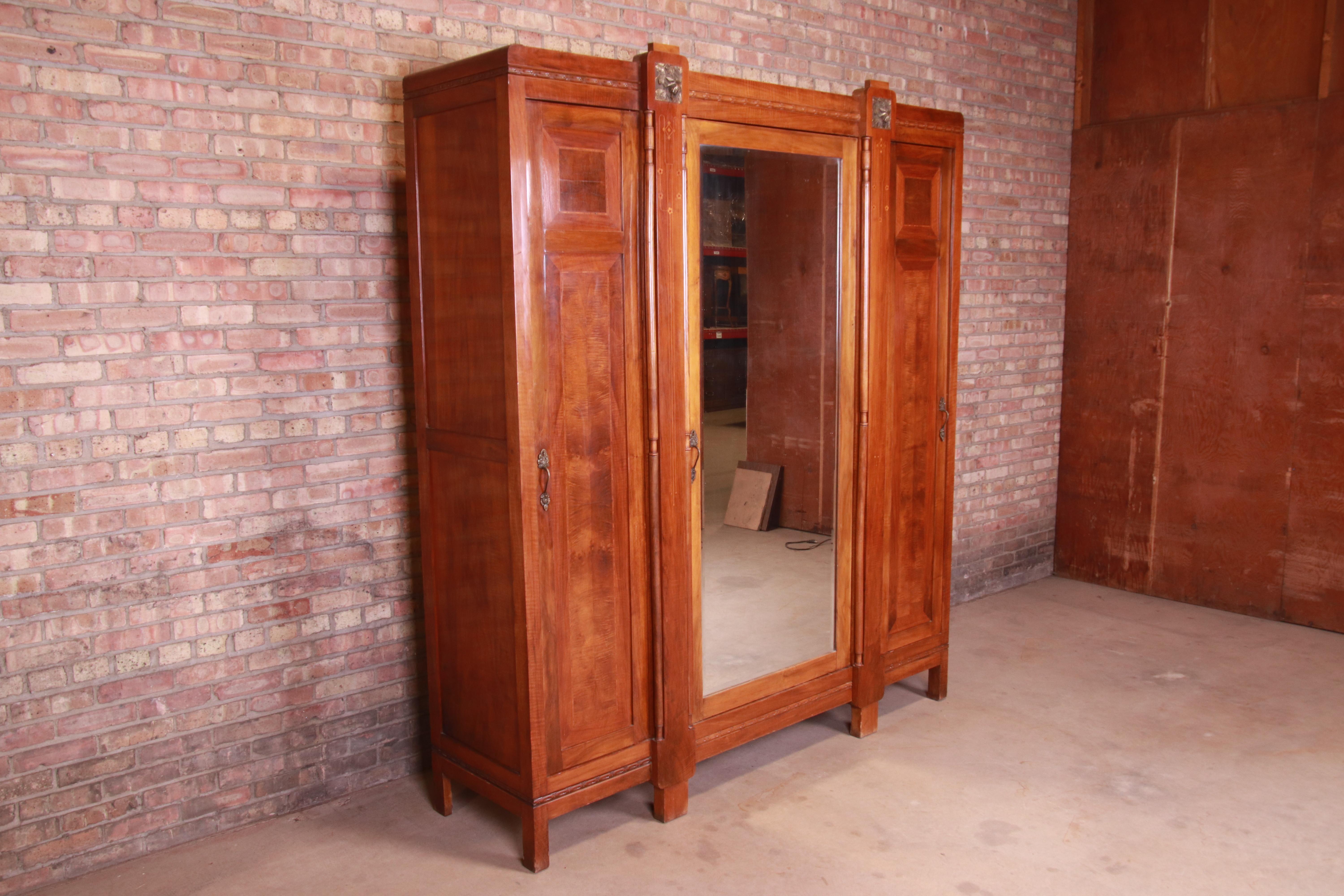 Antique French Art Deco Inlaid Mahogany Mirrored Knockdown Armoire, circa 1920s In Good Condition In South Bend, IN