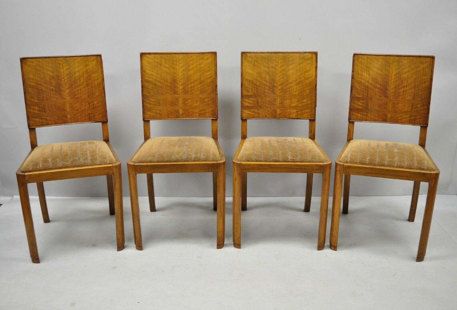 Antique French Art Deco Mahogany Inlaid 5 Piece Dining Room Set. Listing includes 4 side chairs and matching rectangular dining table. Set features beautiful wood grain, band inlay, stretcher support to table, curved and inlaid backs to chairs, drop