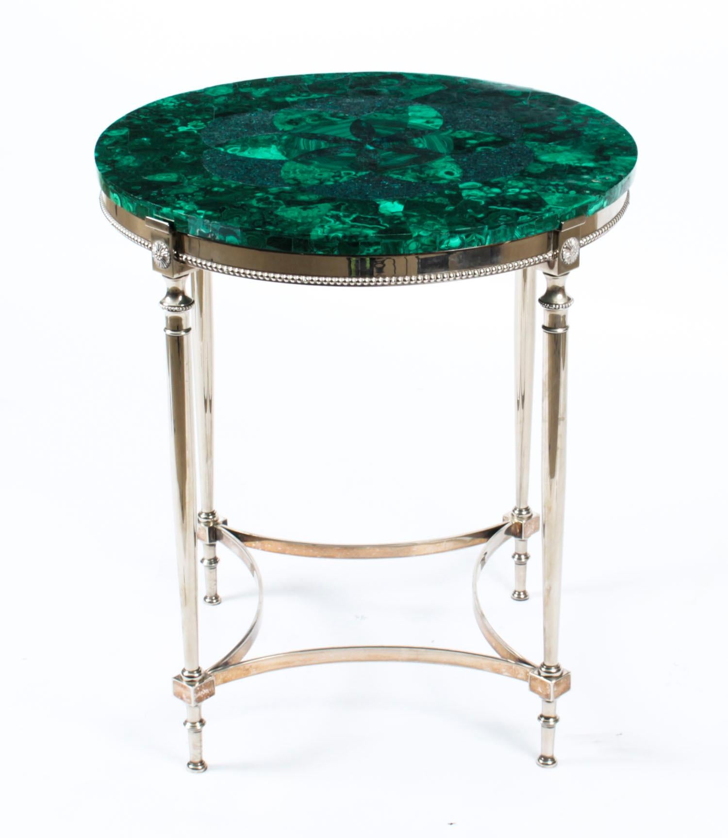 Antique French Art Deco malachite occasional table, circa 1920 in date.

The circular table features a decorative malachite top which sits on a beaded frieze with classical column legs joined by a shaped stretcher.
 
There is no mistaking the