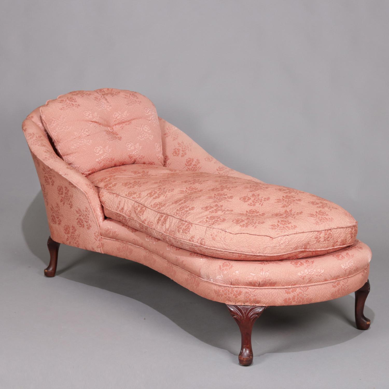 Antique French Art Deco style recamier features asymmetrical and tapered arms with buttoned back pillow, upholstered and raised on carved mahogany Queen Anne style legs, circa 1920

Measures: 29