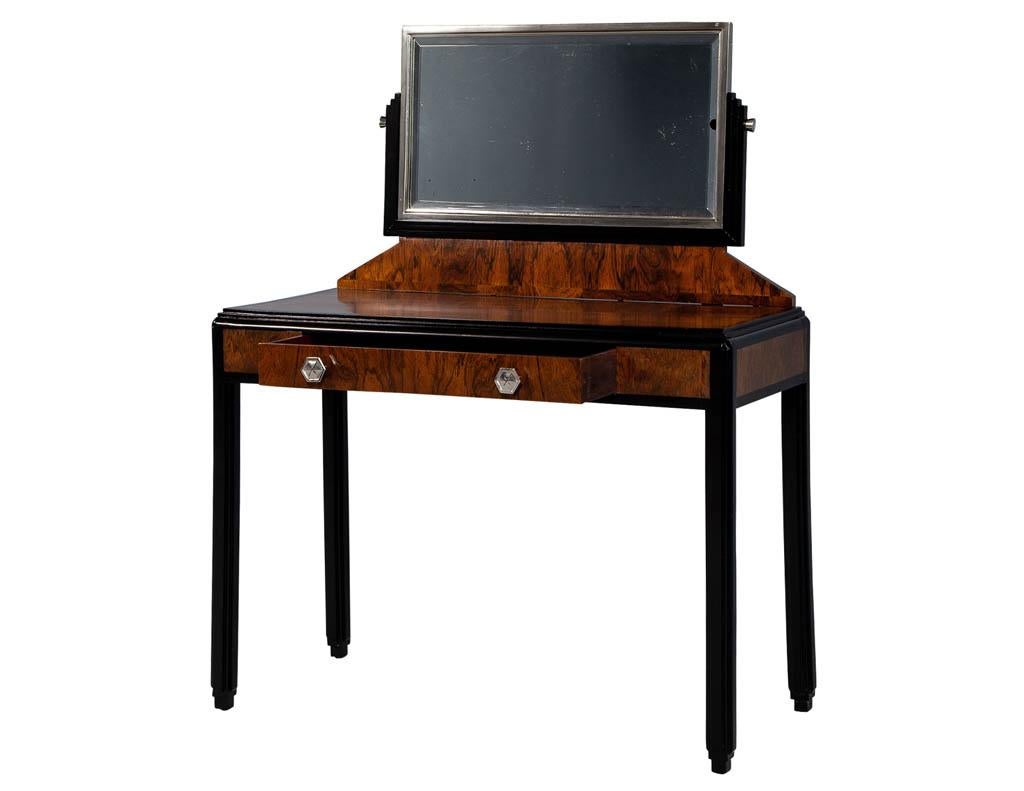 Vintage French Art Deco vanity desk. In its original condition with Classic Art Deco styling and black lacquer accents. Features original tilting mirror. Manufactured in 1940s, France. Mirror does have signs of wear and age with mild pitting. Please