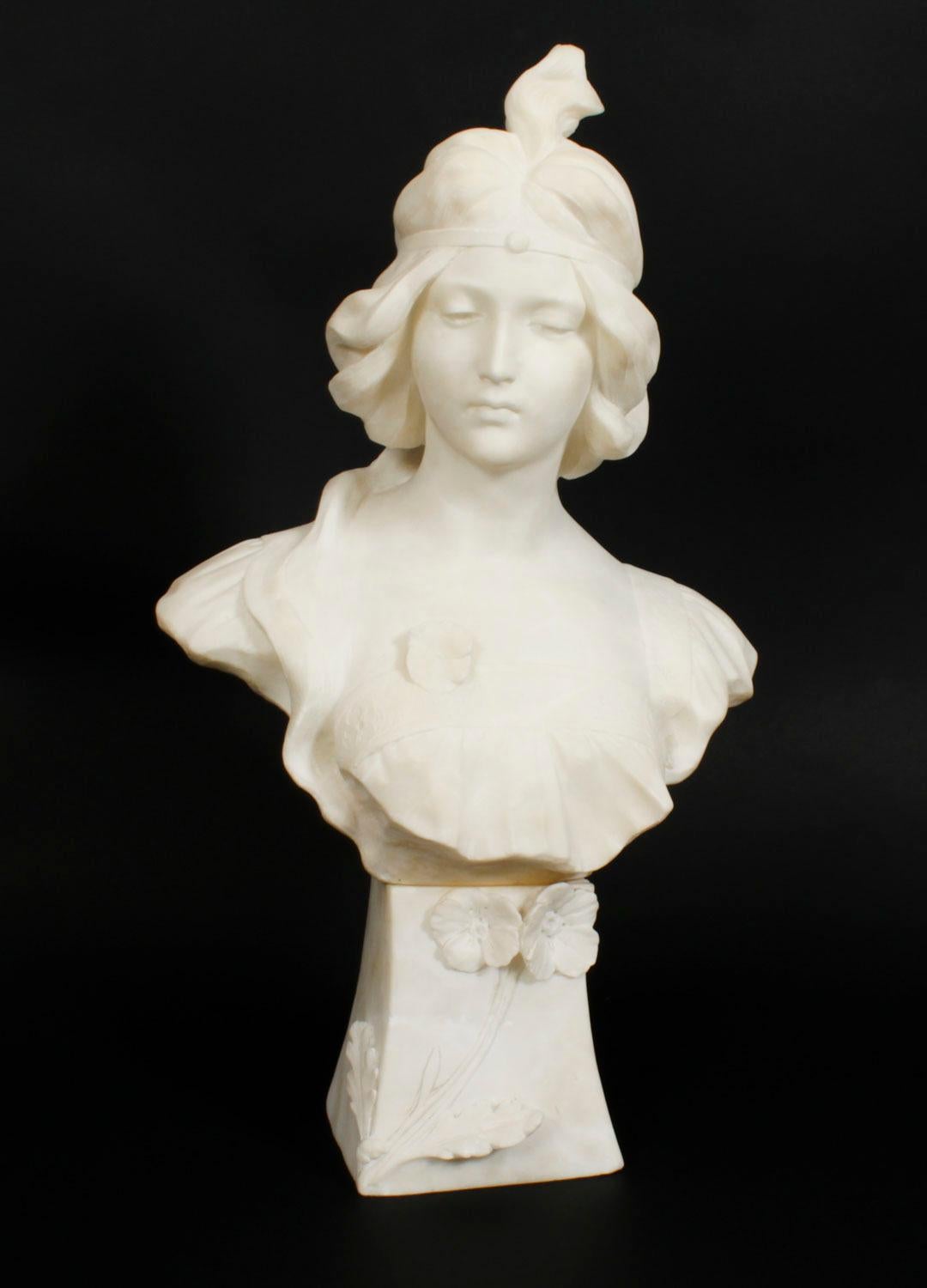 This is beautiful antique French Art Nouveau alabaster shoulder length bust of a beautiful maiden,  Circa 1890 in date.

The  stylized Art Nouveau face and body has been sensitively modelled in alabaster on a shaped floral base.

There is no