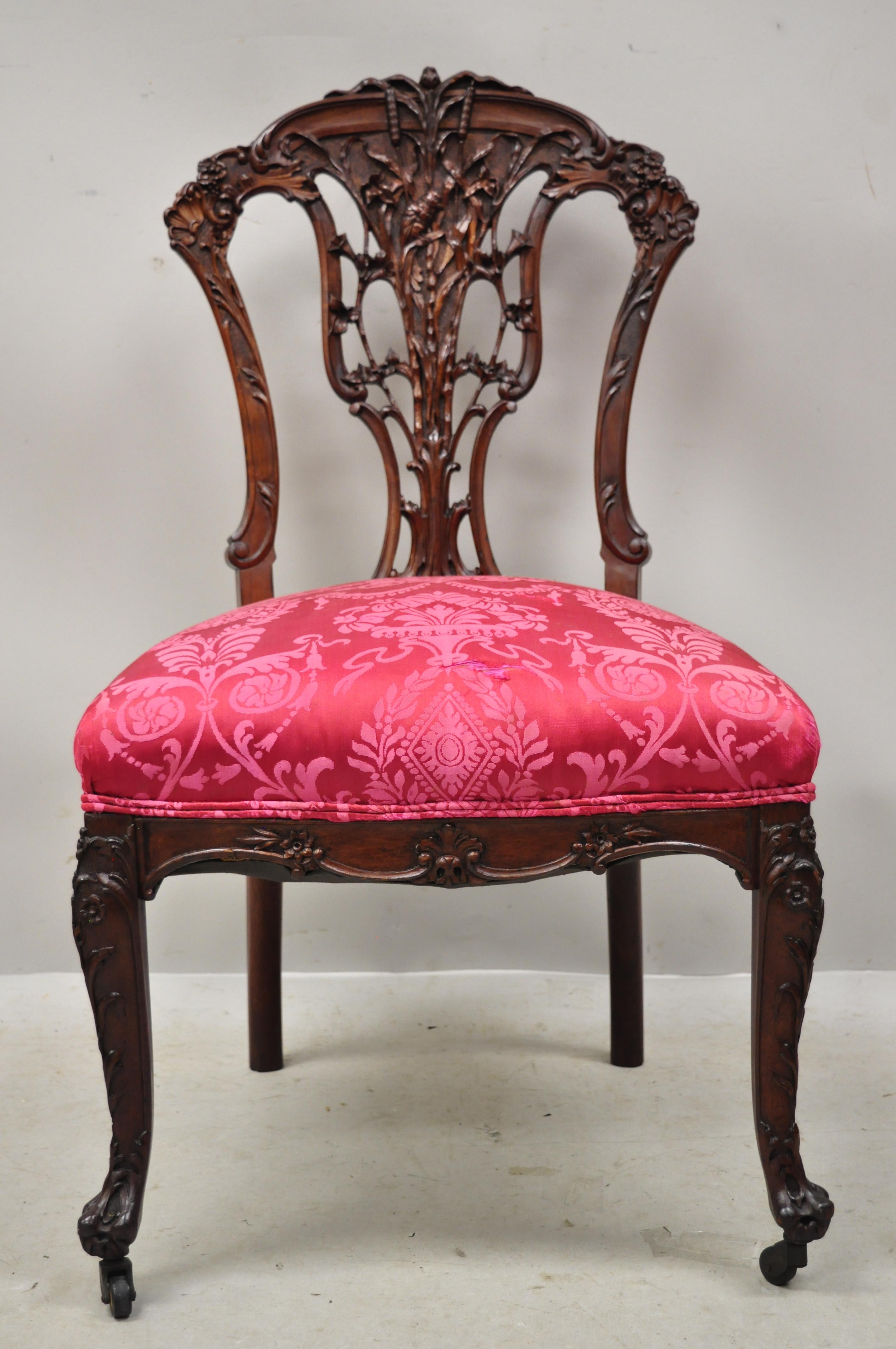 Antique French Art Nouveau bird and flower carved mahogany accent side chair. Item features solid wood frame, nicely carved details, cabriole legs, very nice antique item, circa early 1900s. Measurements: 35