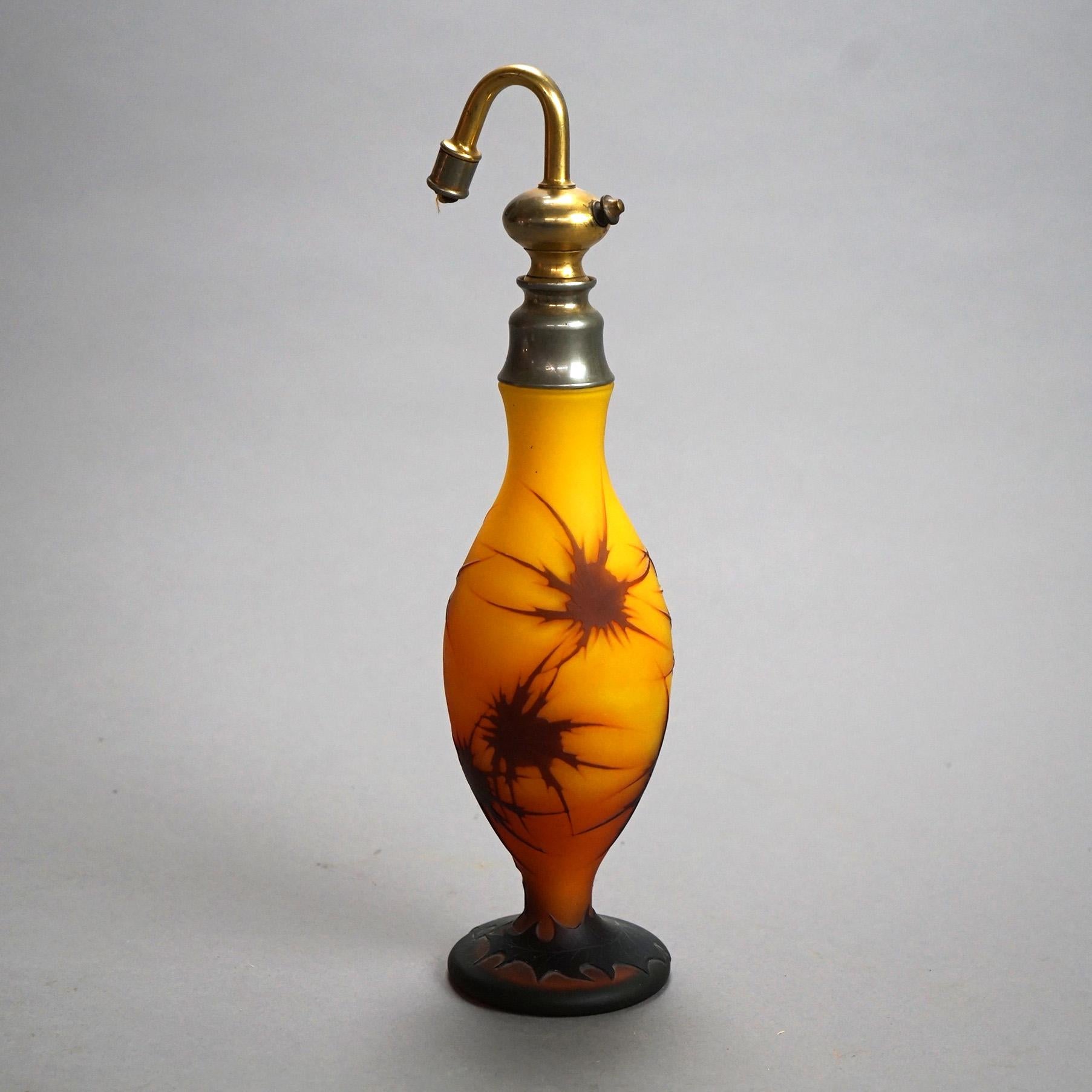 An antique Art Nouveau French perfume atomizer offers art glass construction with cameo cutback stylized floral design, c1920

Measures - 11.25