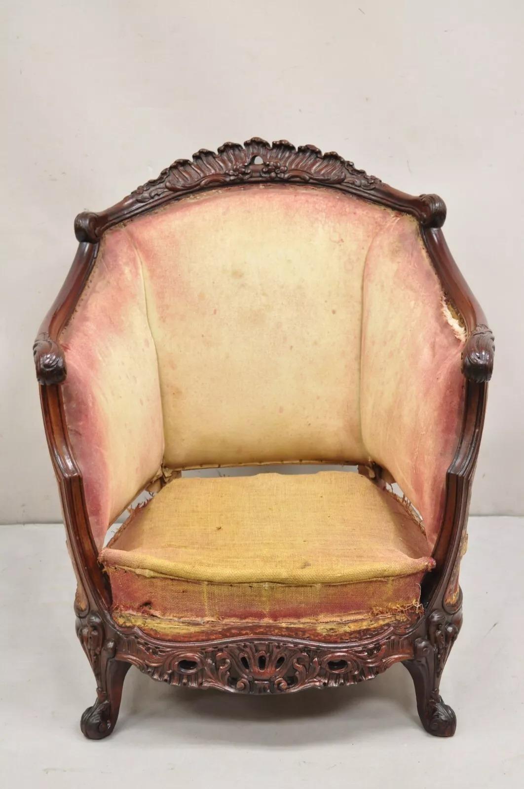 Antique French Art Nouveau Carved Mahogany Bergere Club Chair Frame. Item features a wonderfully carved frame, solid wood construction, very nice antique chair to refurbish. The wood frame looks to have been more recently professionally refinished.