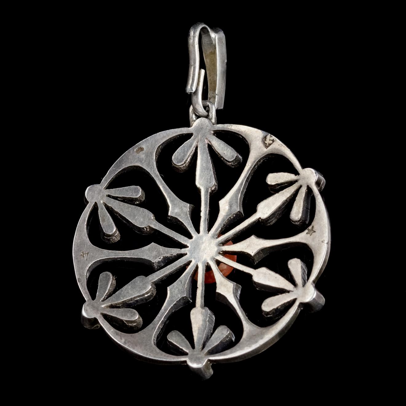 This delightful antique Victorian French snowflake pendant was made in the Art Nouveau style, Circa 1900. 

Art Nouveau was an international art style that was popular across Europe between 1890 and 1910. Art Nouveau jewellery drew it’s inspiration
