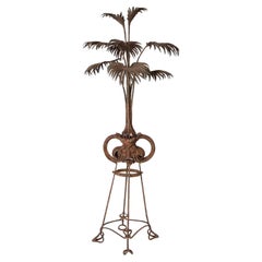 Antique French Art Nouveau Escultura de hierro con planta de palma sobre soporte