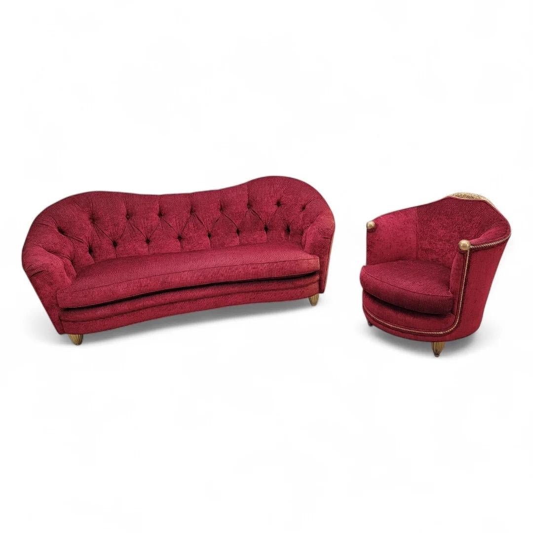 Antique French Art Nouveau Maurice Dufrene Footed Barrel Back Lounge Chair and Tufted Back Boudoir Sofa in a Deep Red Velvet Chenille  

This Antique French Art Nouveau lounge chair and boudoir sofa set designed by Maurice Dufrene, showcase a